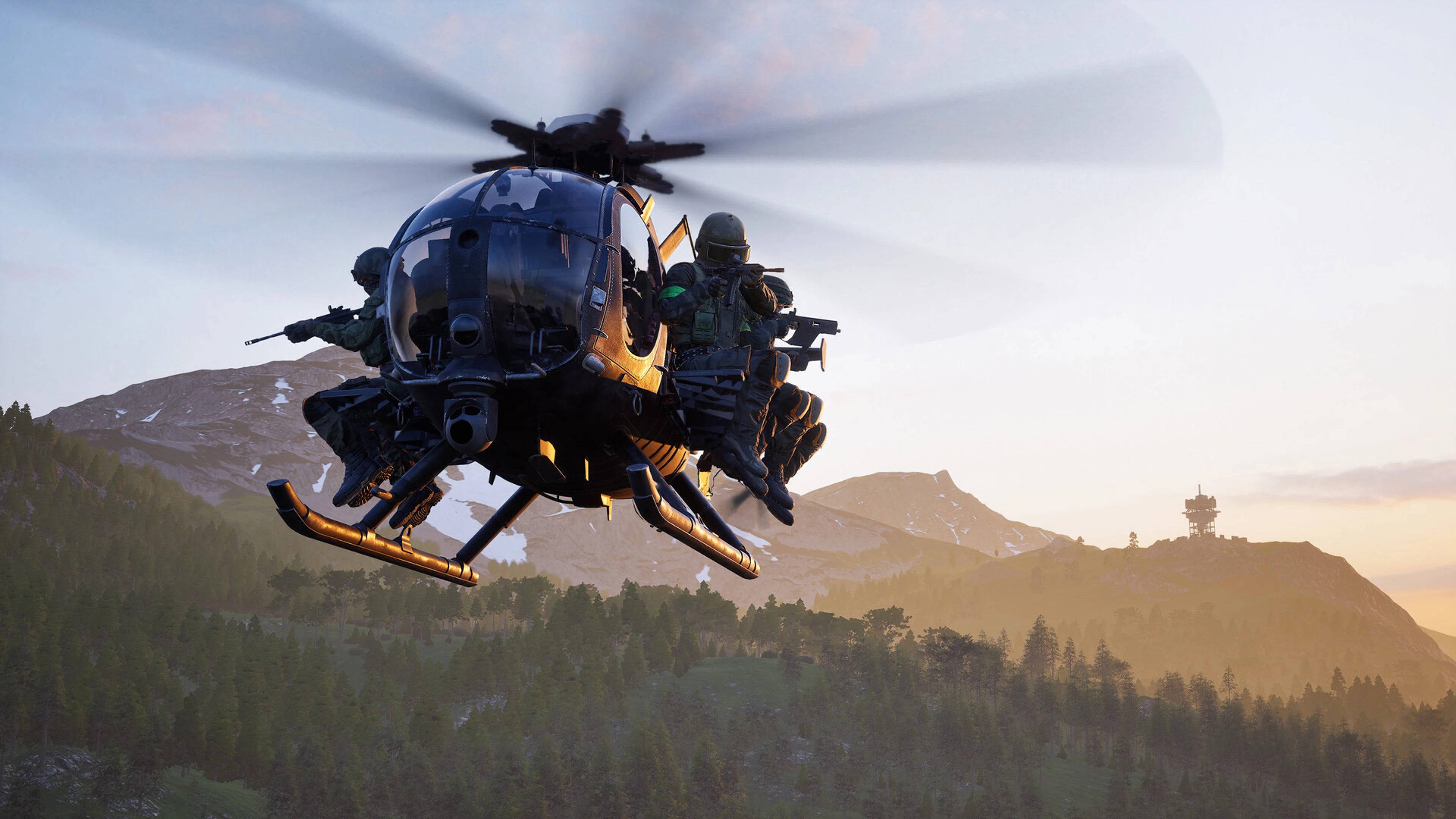 A WARDOGS helicopter carries armed soldiers above a mountain battlefield at sunset.