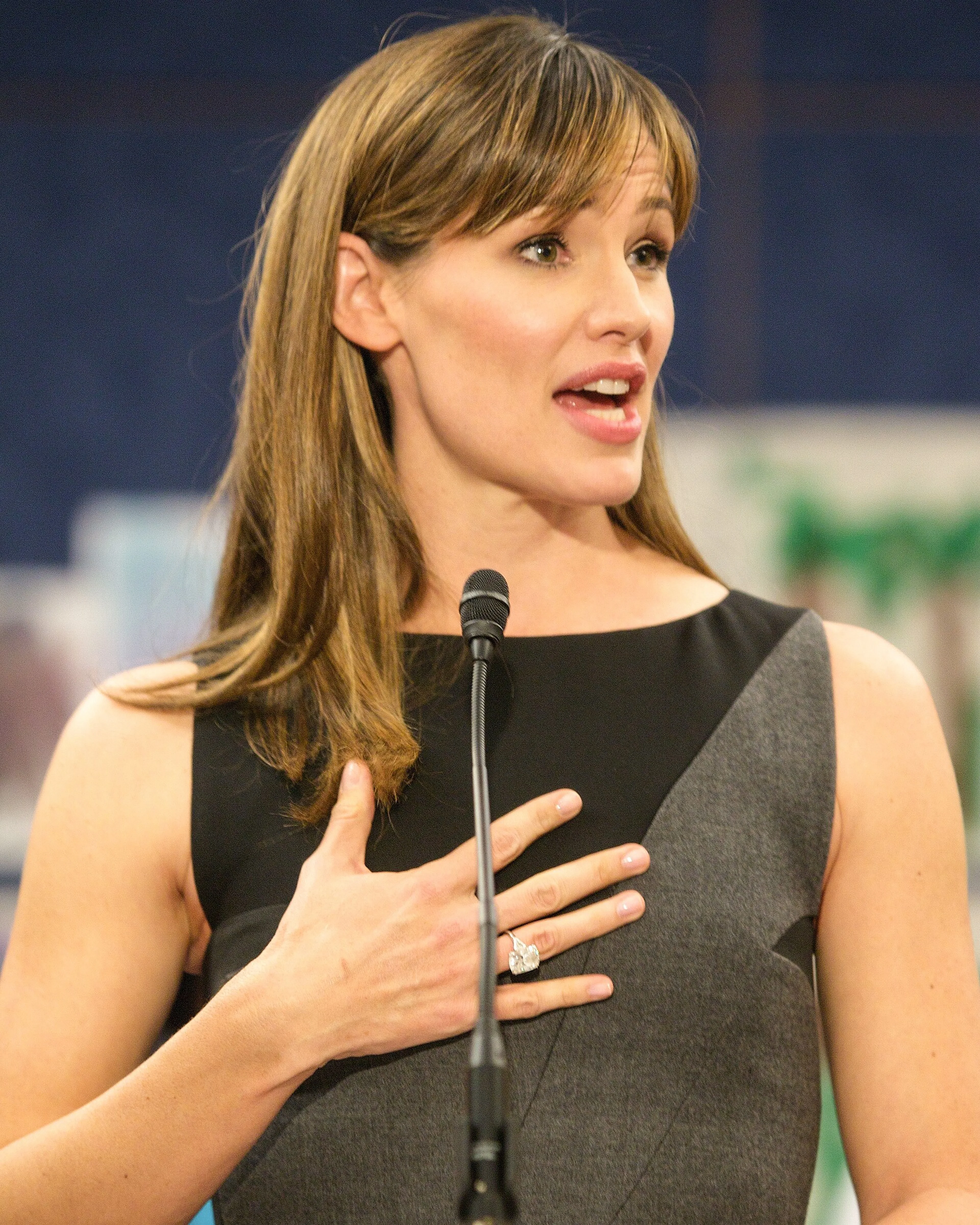 Jennifer Garner speaks into a microphone at a 2013 education event.