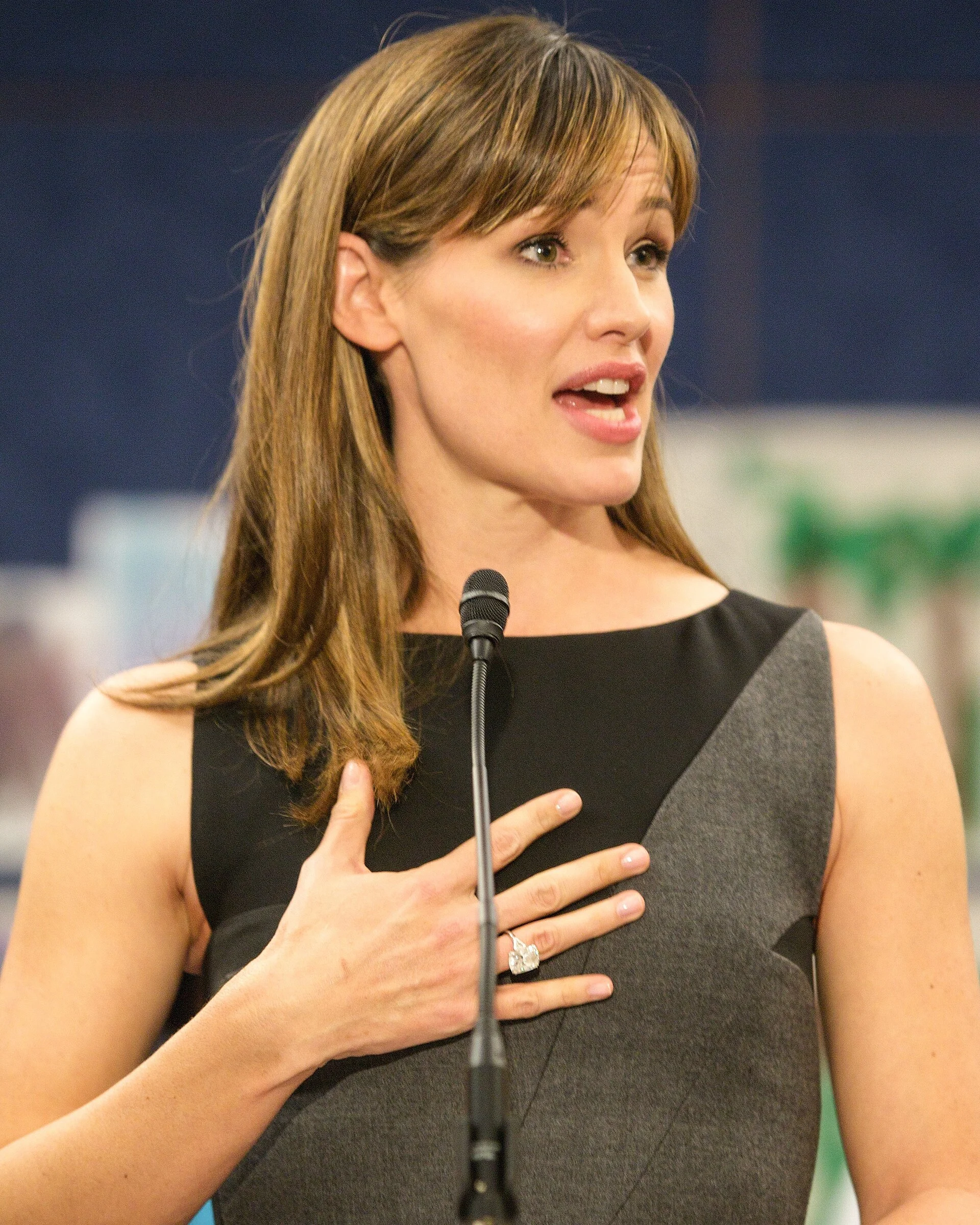Jennifer Garner speaks into a microphone at a 2013 education event.