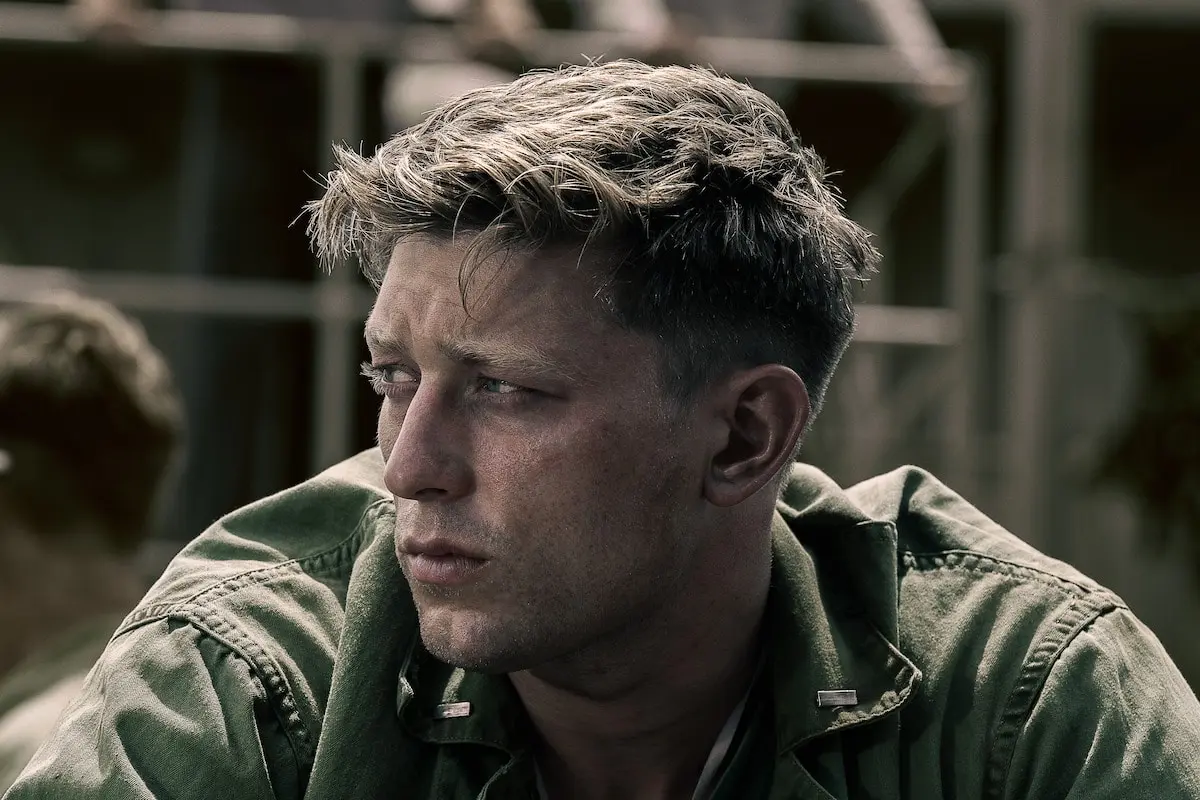 Tom Francis as Dave Schreiner looks thoughtful in a clear The Mosquito Bowl still.