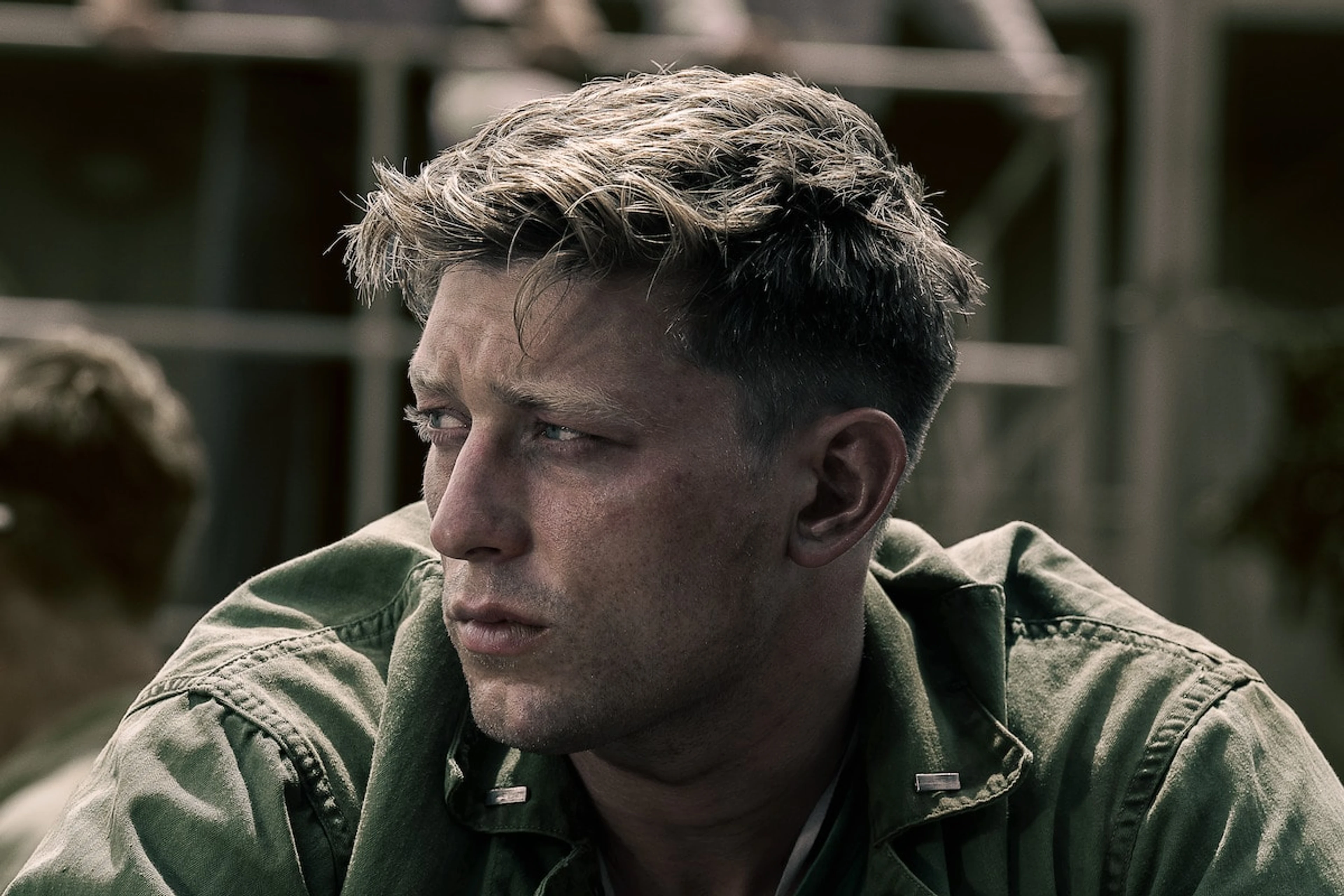 Tom Francis as Dave Schreiner looks thoughtful in a clear The Mosquito Bowl still.