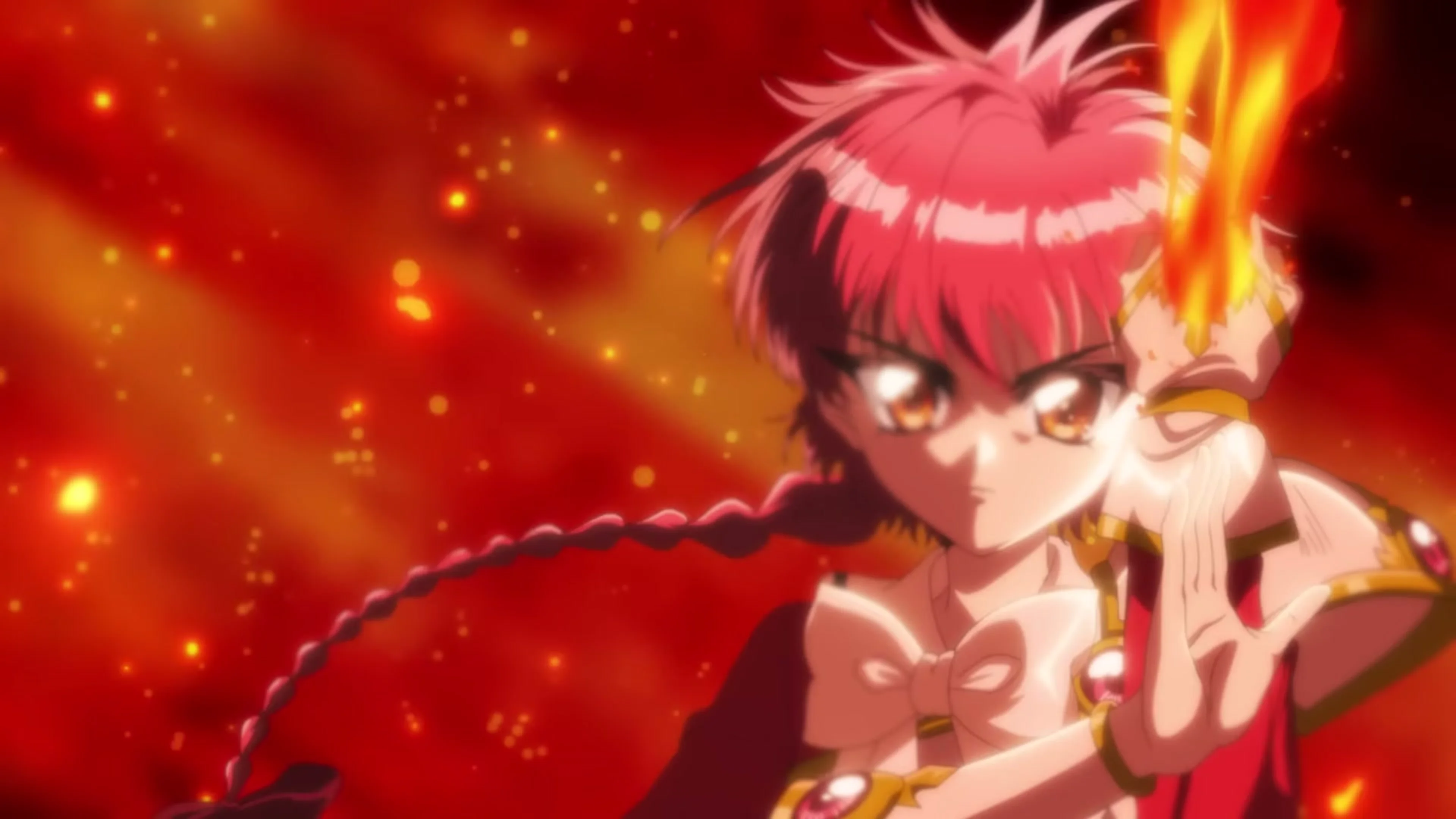 Hikaru Shidou raises her sword as red flames surround her in Magic Knight Rayearth.