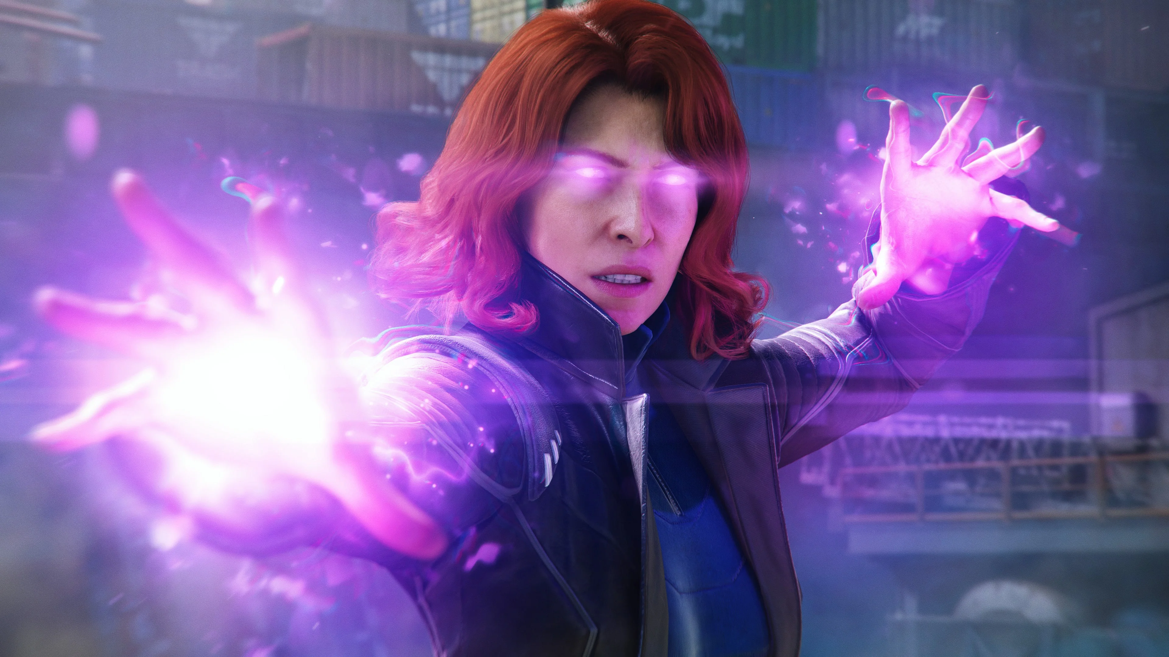 Jean Grey holds up both hands as purple energy surrounds them.
