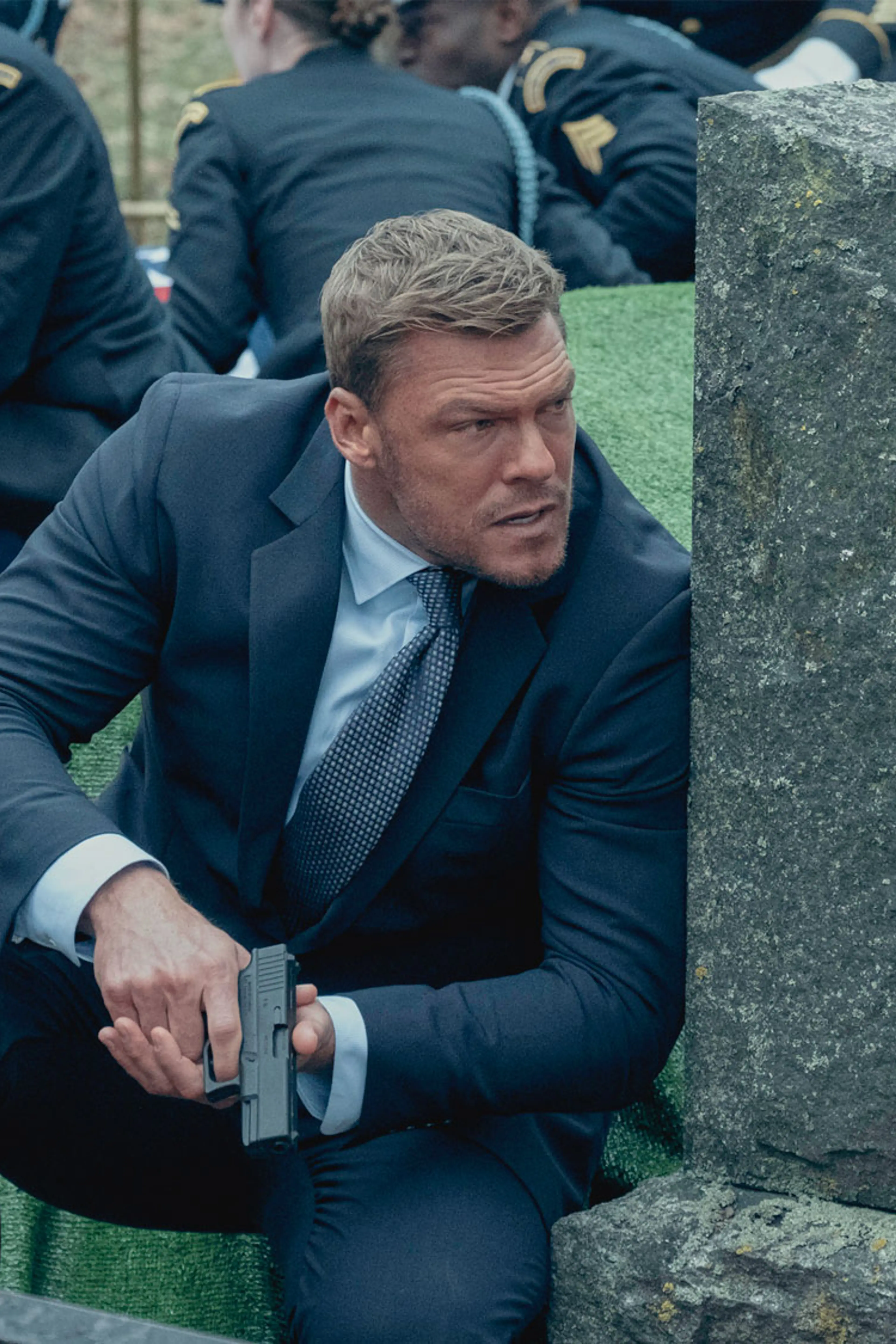 Alan Ritchson as Jack Reacher in Reacher Season 4.