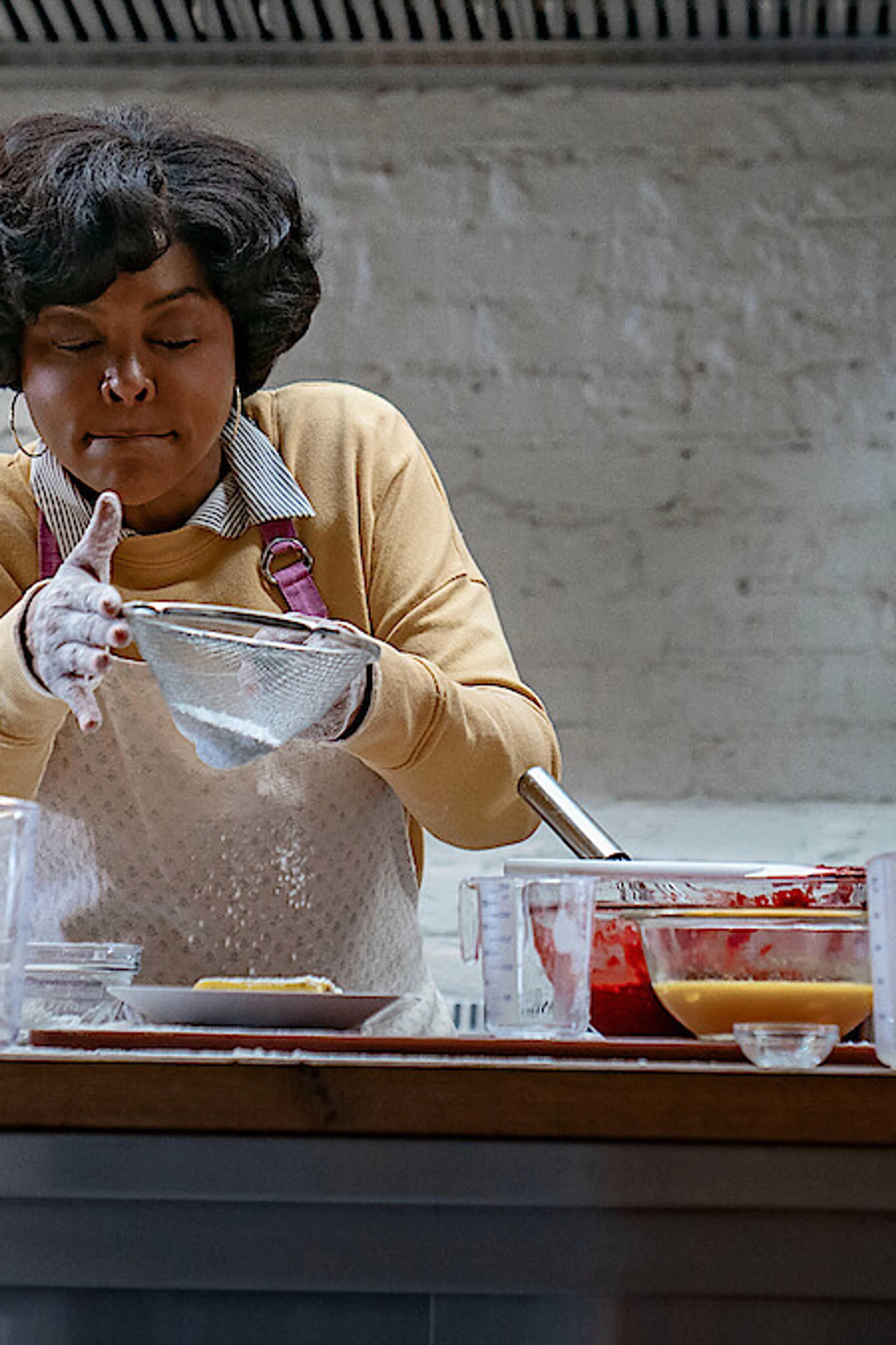 Taraji P. Henson prepares food in a bakery kitchen in Give Me Some Sugah.