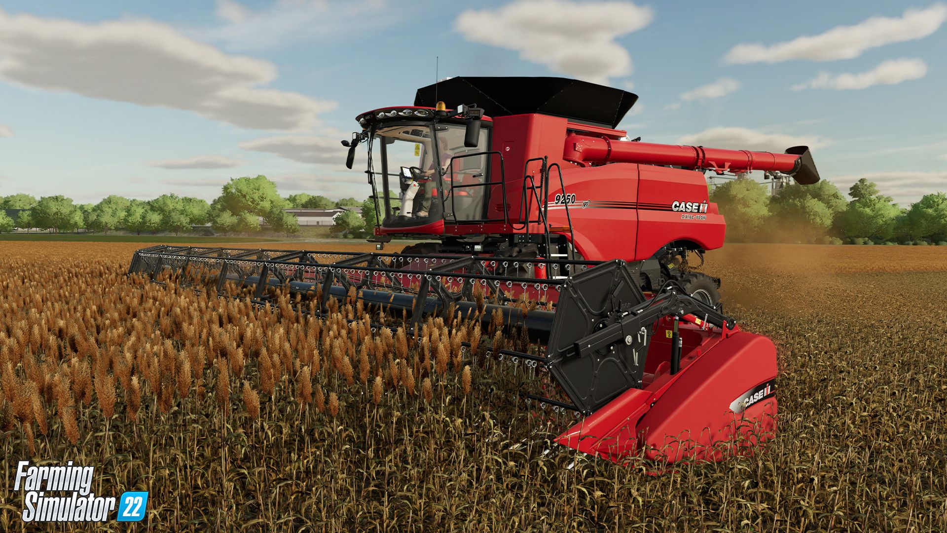 A red combine harvester cuts a crop while leaving a harvested strip behind it.