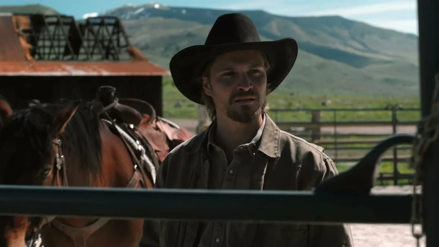 Kayce Dutton stands beside a horse in Marshals Season 2.