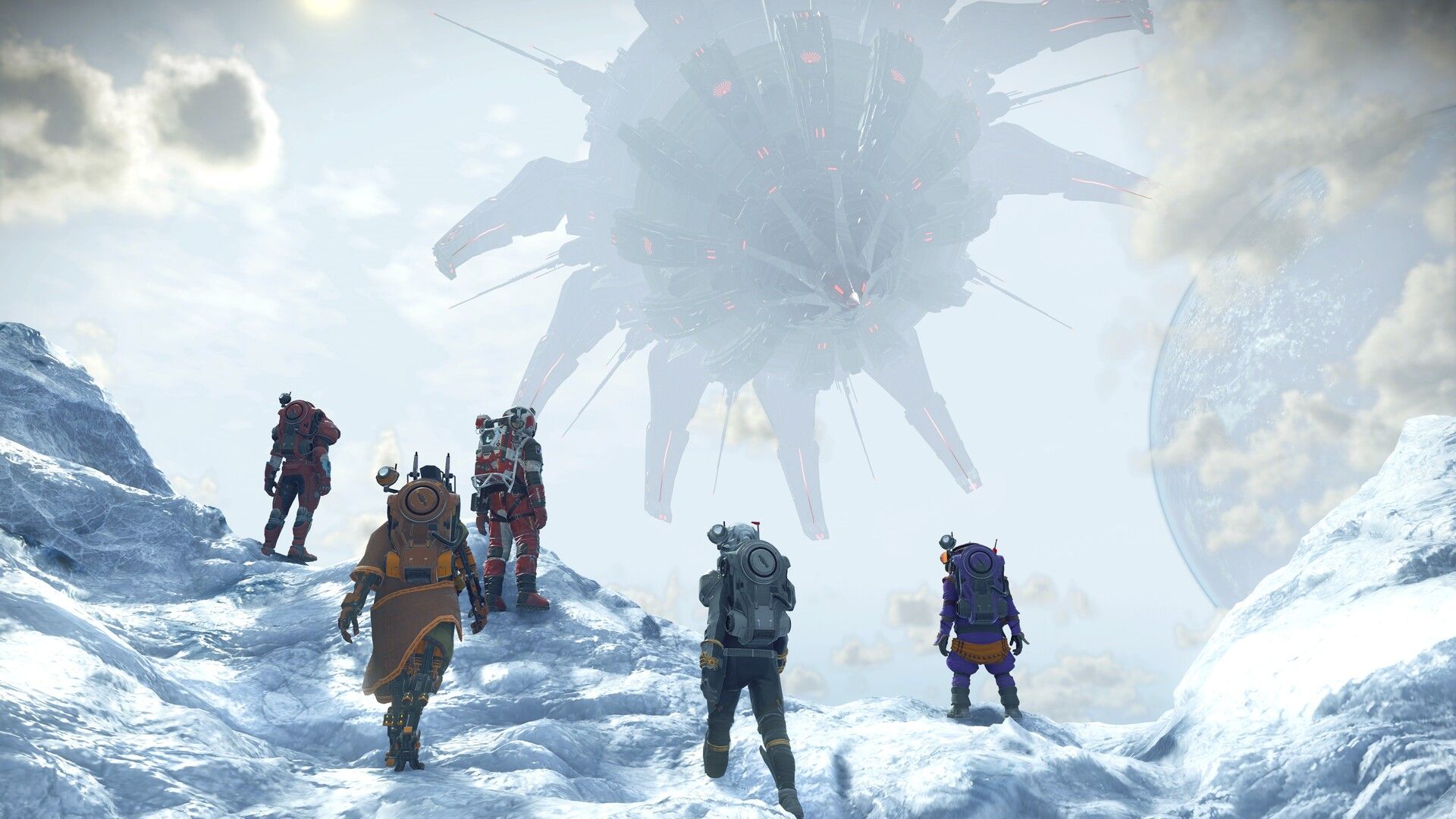 Five travelers on snowy ground look up at an enormous hovering structure in No Man's Sky.