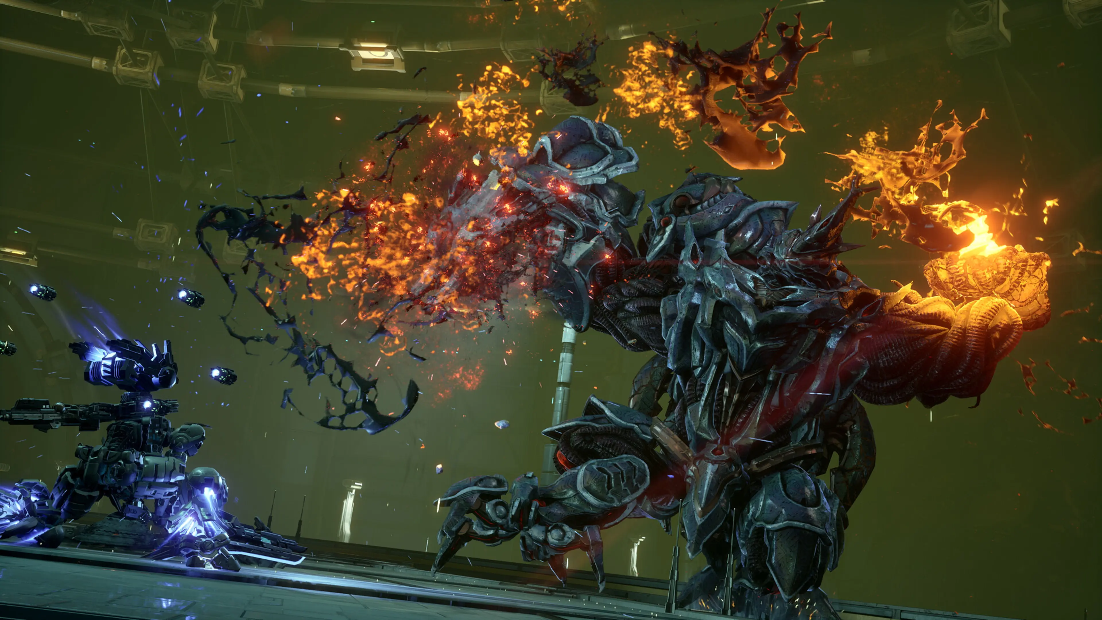 Gundam Helix fires at a huge armored enemy during a fiery battle.