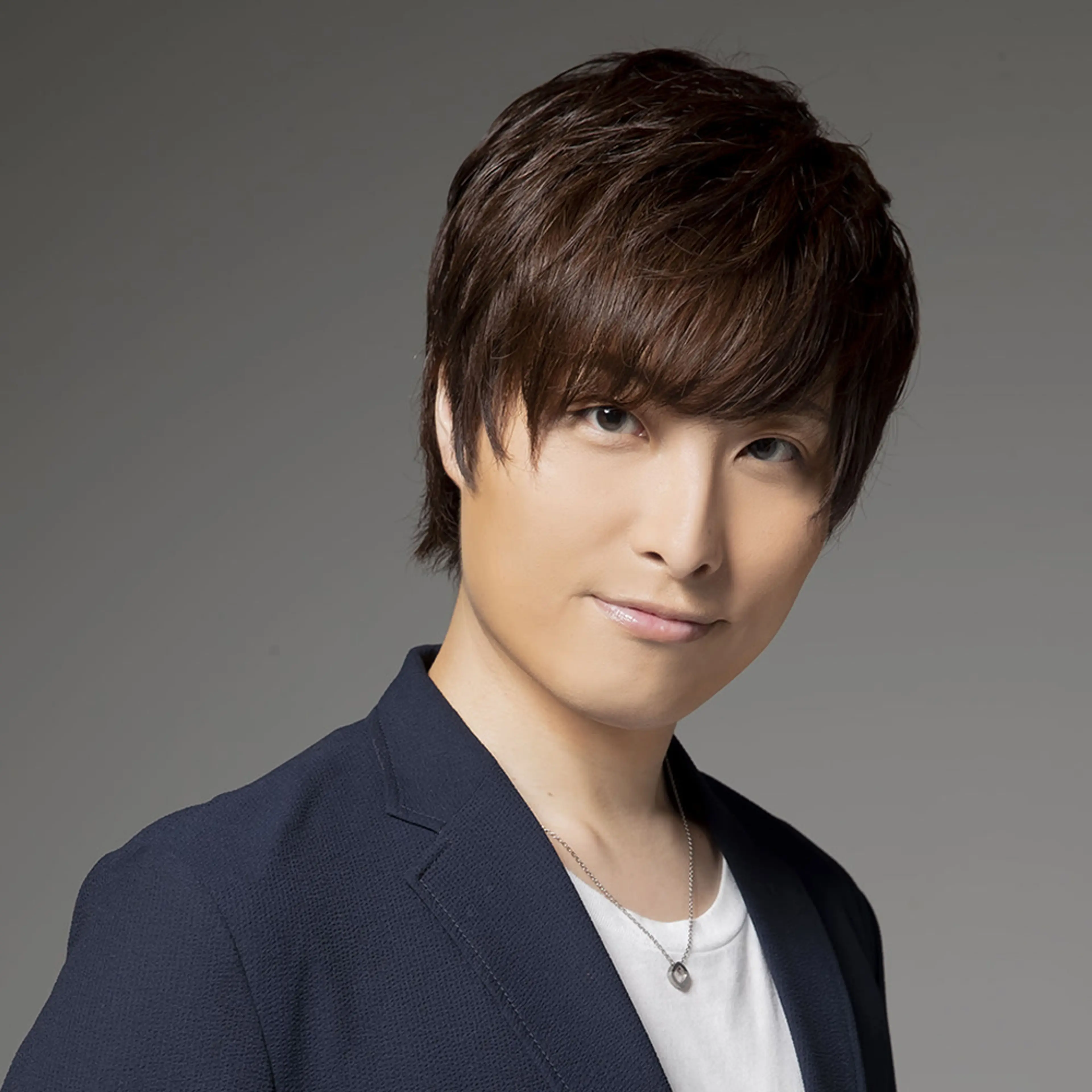 Japanese voice actor Yusuke Tonozaki in an official Across Entertainment portrait.