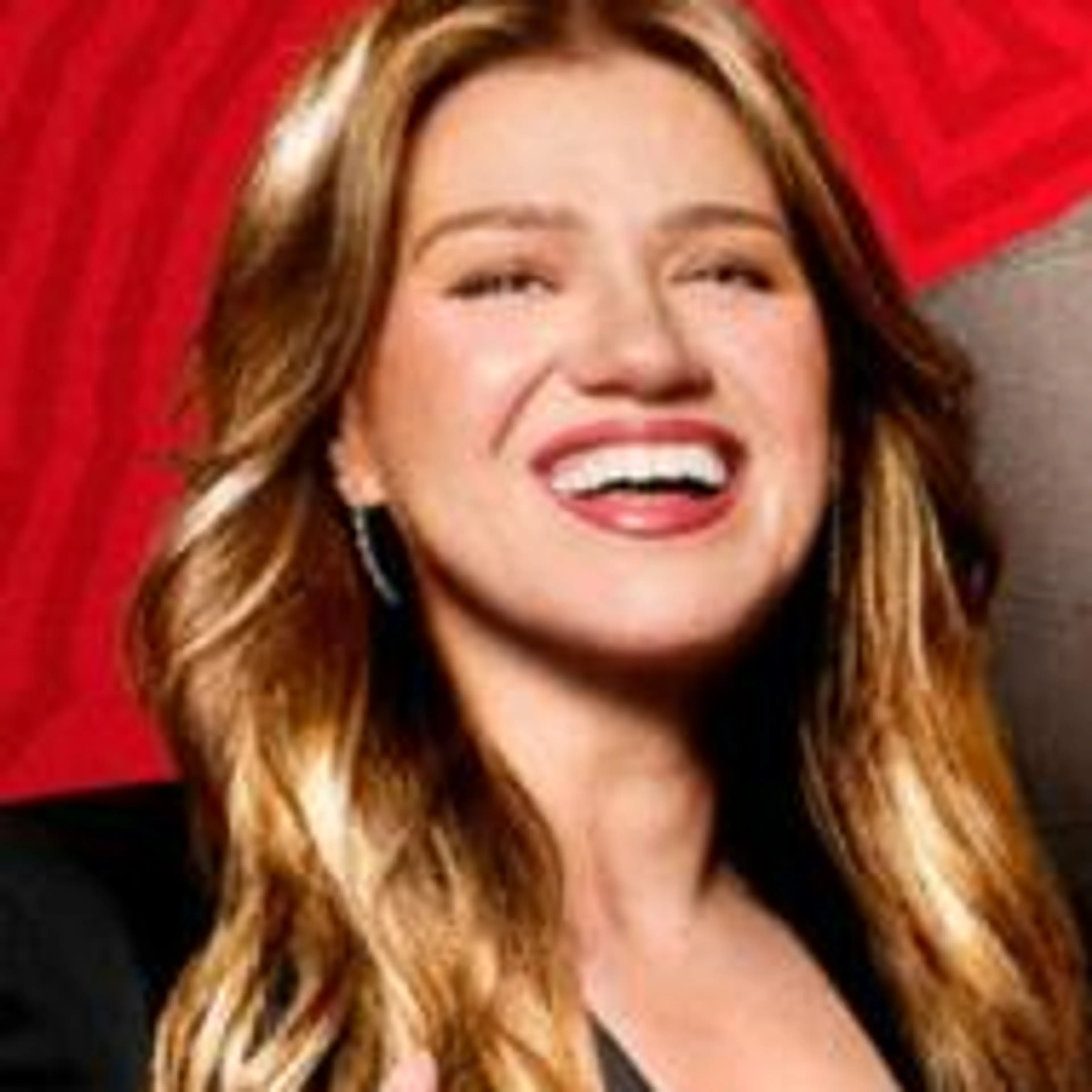 Kelly Clarkson in NBCUniversal's The Voice season 30 promotional image.