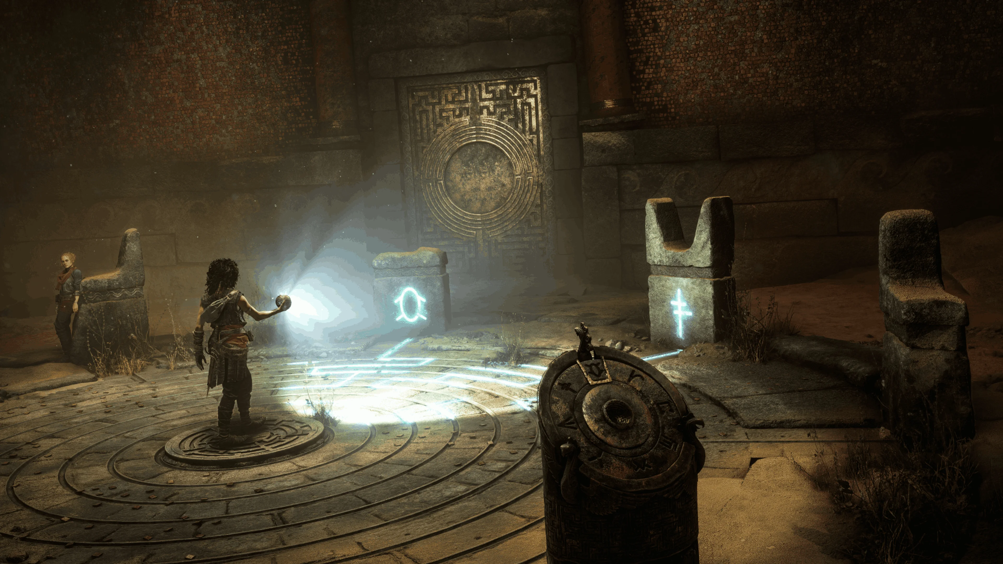 Sophia uses a glowing Minoan sphere while Leni watches inside an ancient puzzle chamber.