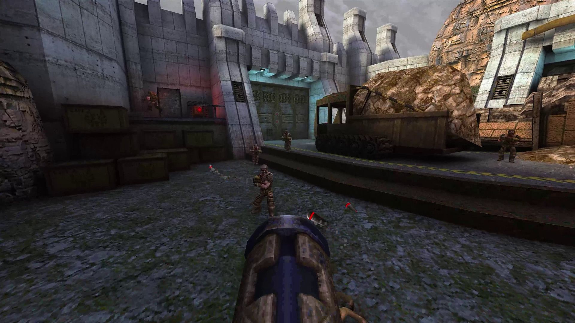 Armed enemies guard an industrial courtyard in Quake.