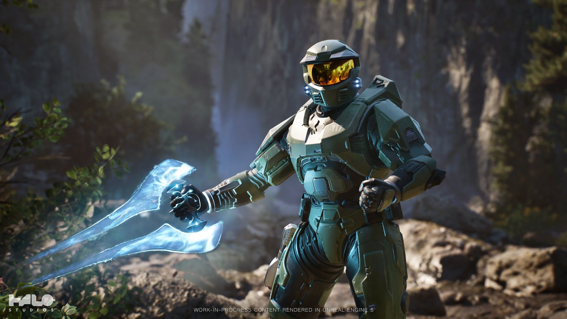 Master Chief holds an Energy Sword in a forest scene from Halo Studios’ Project Foundry demonstration.