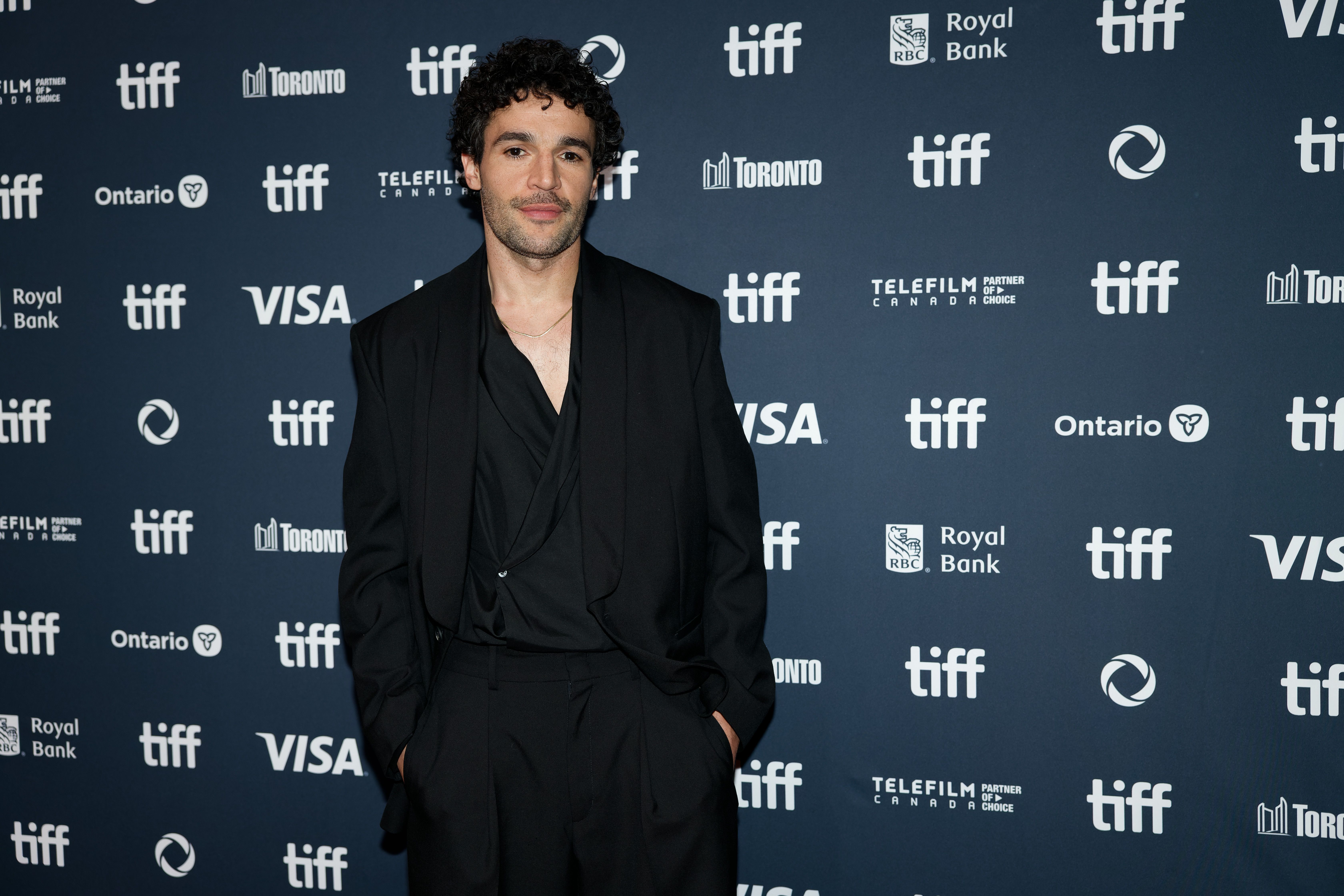 Christopher Abbott wearing a black suit at the Toronto International Film Festival in September 2024.