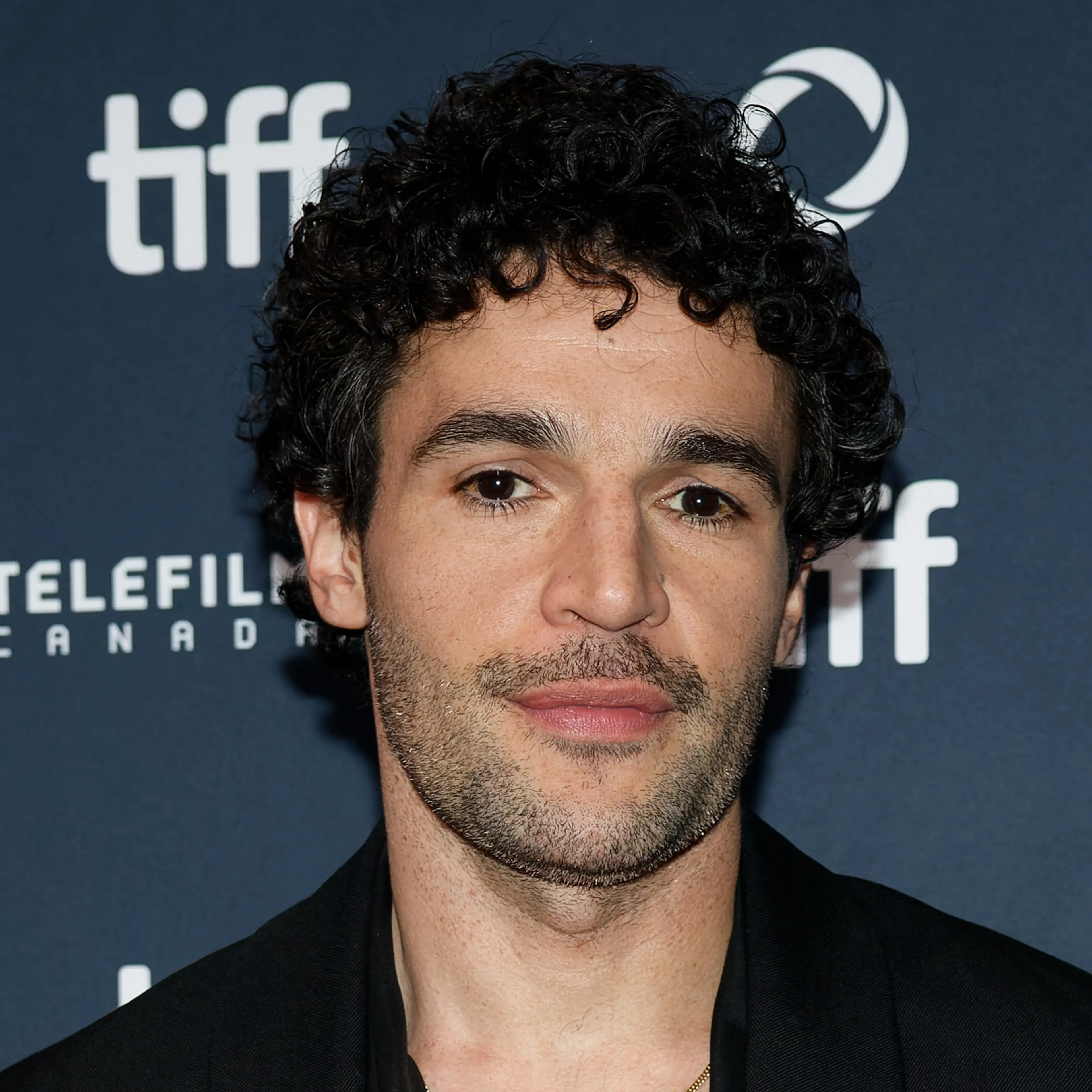 Christopher Abbott wearing a black suit at the Toronto International Film Festival in September 2024.