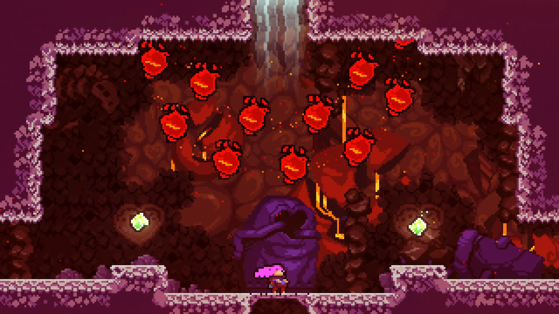 Madeline faces a red cave platforming challenge in Celeste.