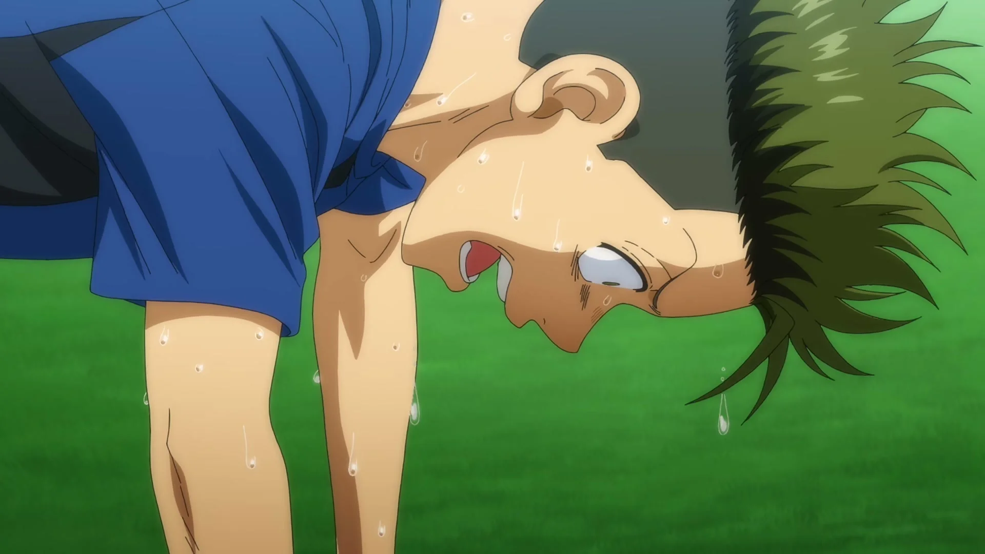 A sweaty Esperion player bends over on the soccer field in the official Aoashi Season 2 trailer.