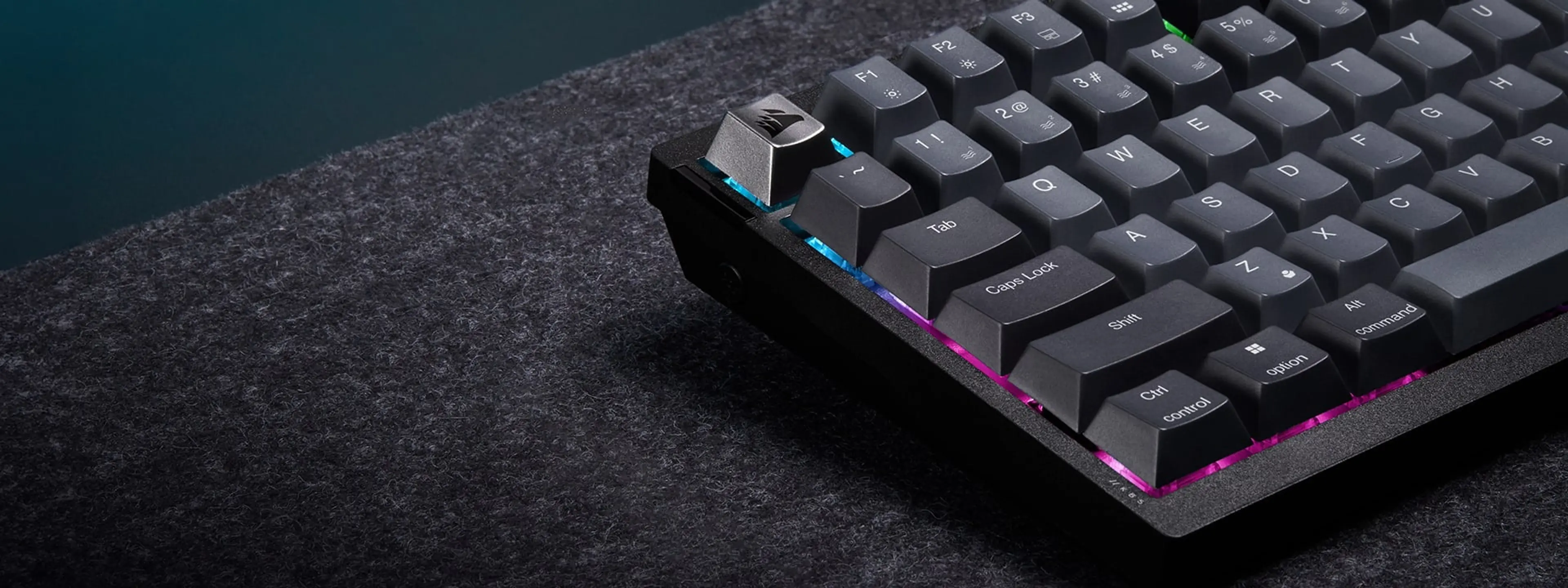 Close view of the K65 Plus left-hand keys and gray keycaps