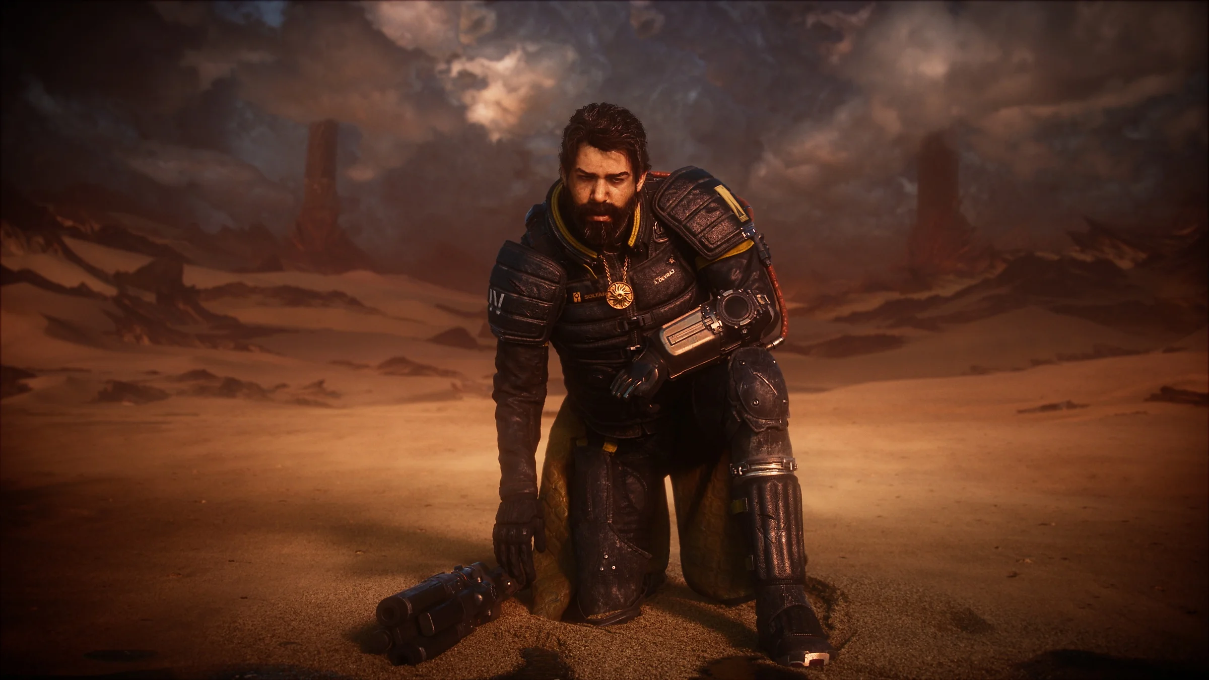 Arjun Devraj rises from the sand with his weapon in Saros.