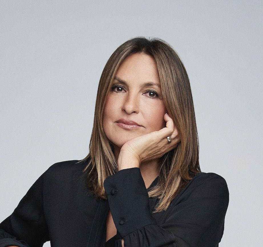 Mariska Hargitay rests her face on her hand in an official portrait by Matt Doyle.