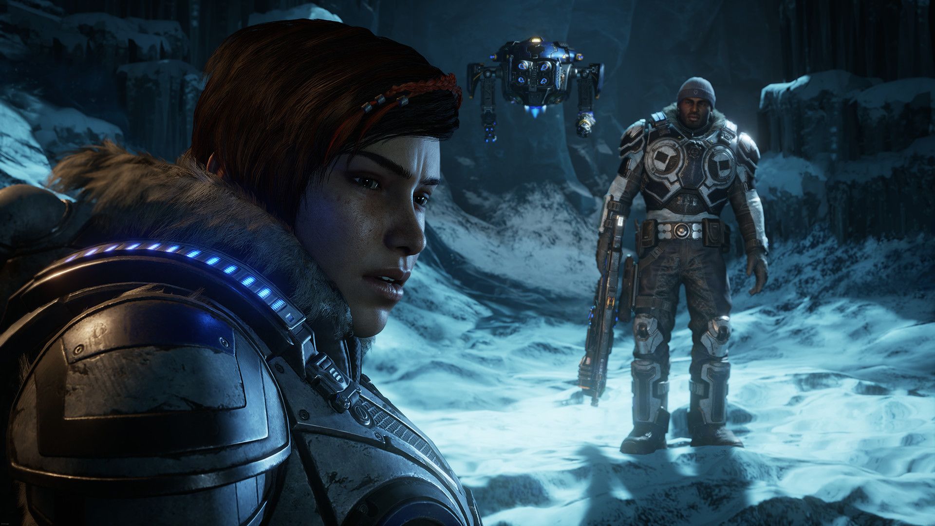 Kait stands in the foreground of a snowy area with a soldier and the flying robot Jack behind her.