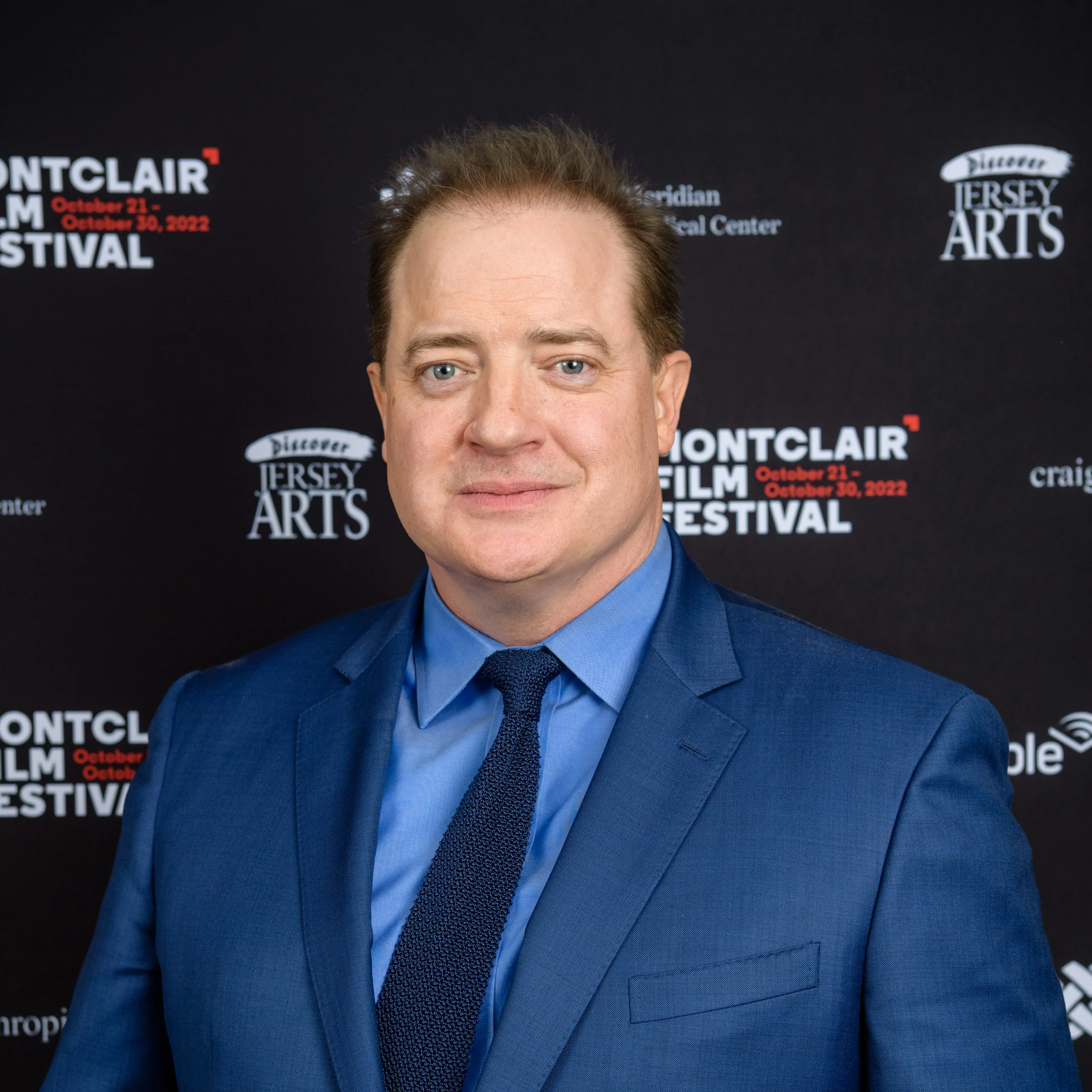 Brendan Fraser wears a blue suit at the 2022 Montclair Film Festival.