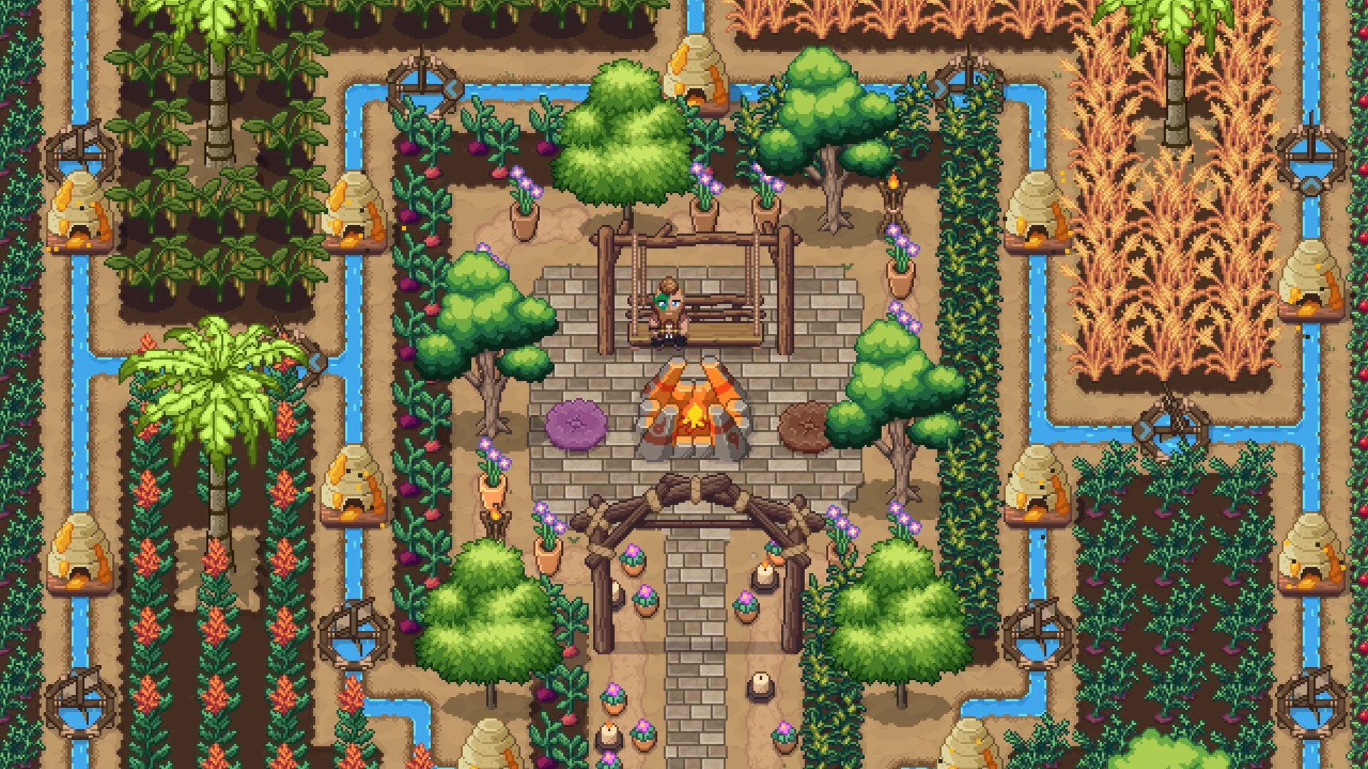 A developed Roots of Pacha village with fields, paths and communal buildings.