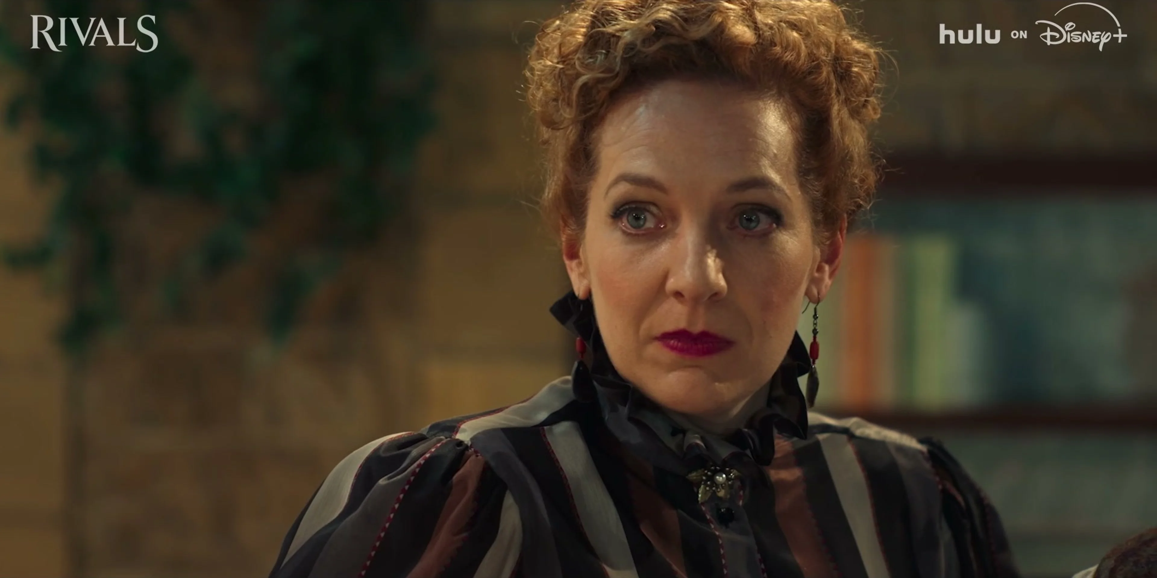 A woman appears in a dramatic close-up in the Rivals trailer.