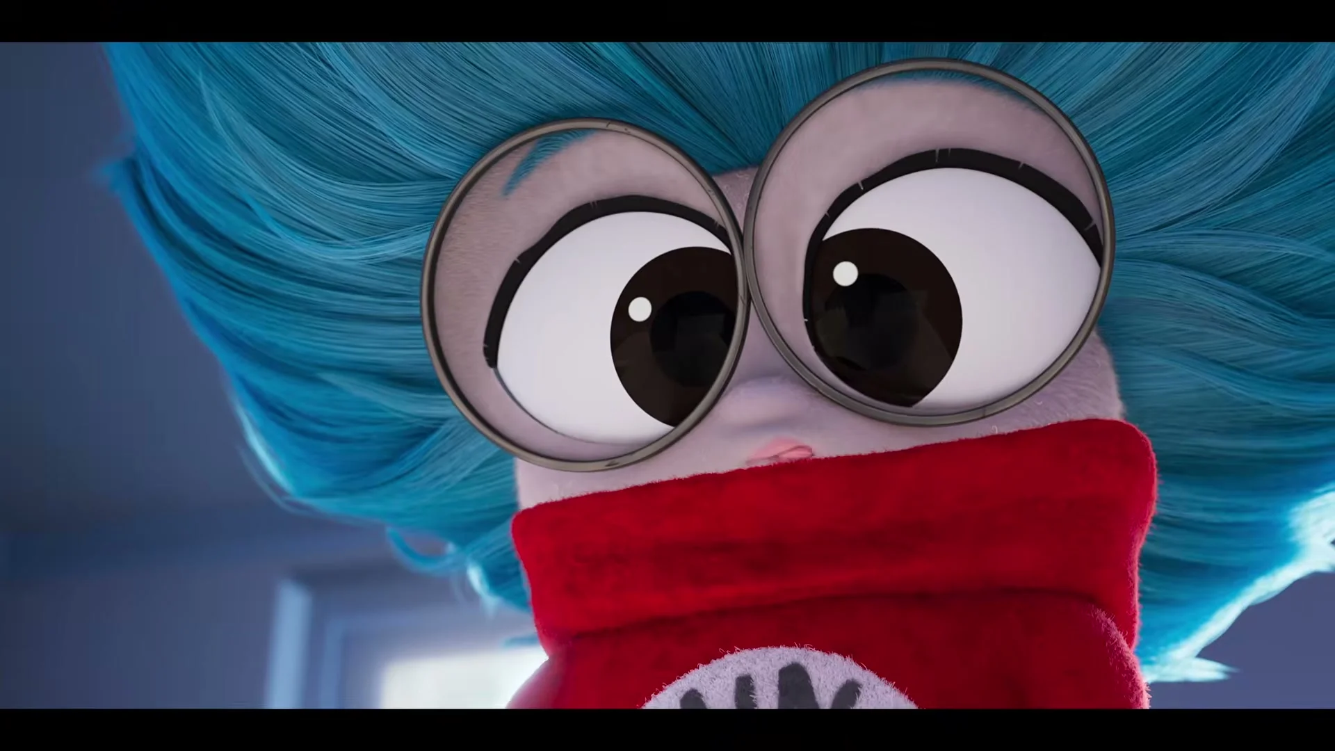 A blue-haired animated character wearing a red scarf appears in The Cat in the Hat main trailer.