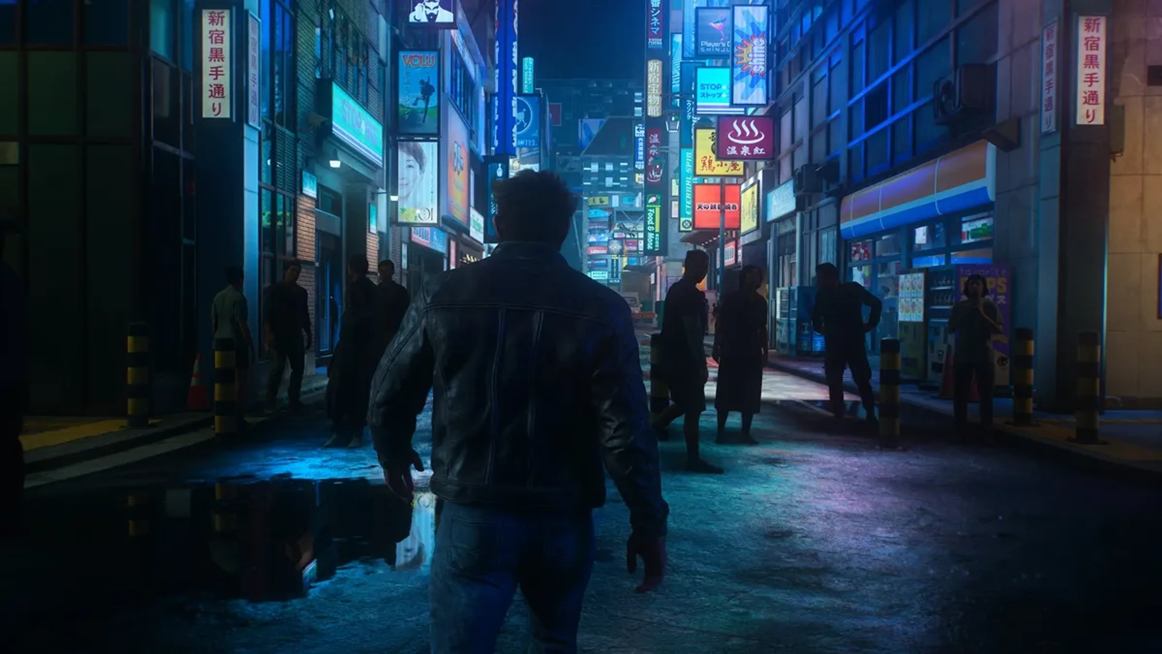 Logan walks through a crowded Japanese street lined with illuminated shop signs.