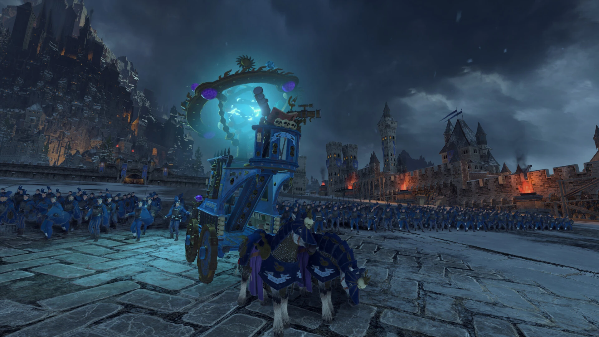 Middenland troops advance beside a blue wagon outside a fortress in Total War: Warhammer III.