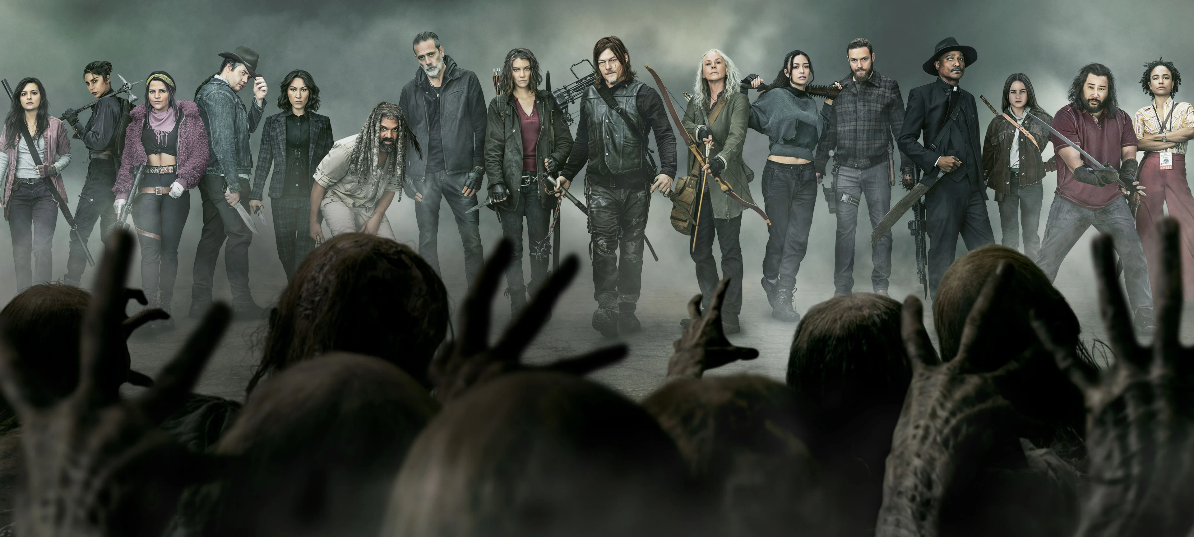 The Walking Dead cast faces a crowd of walkers in official AMC artwork.