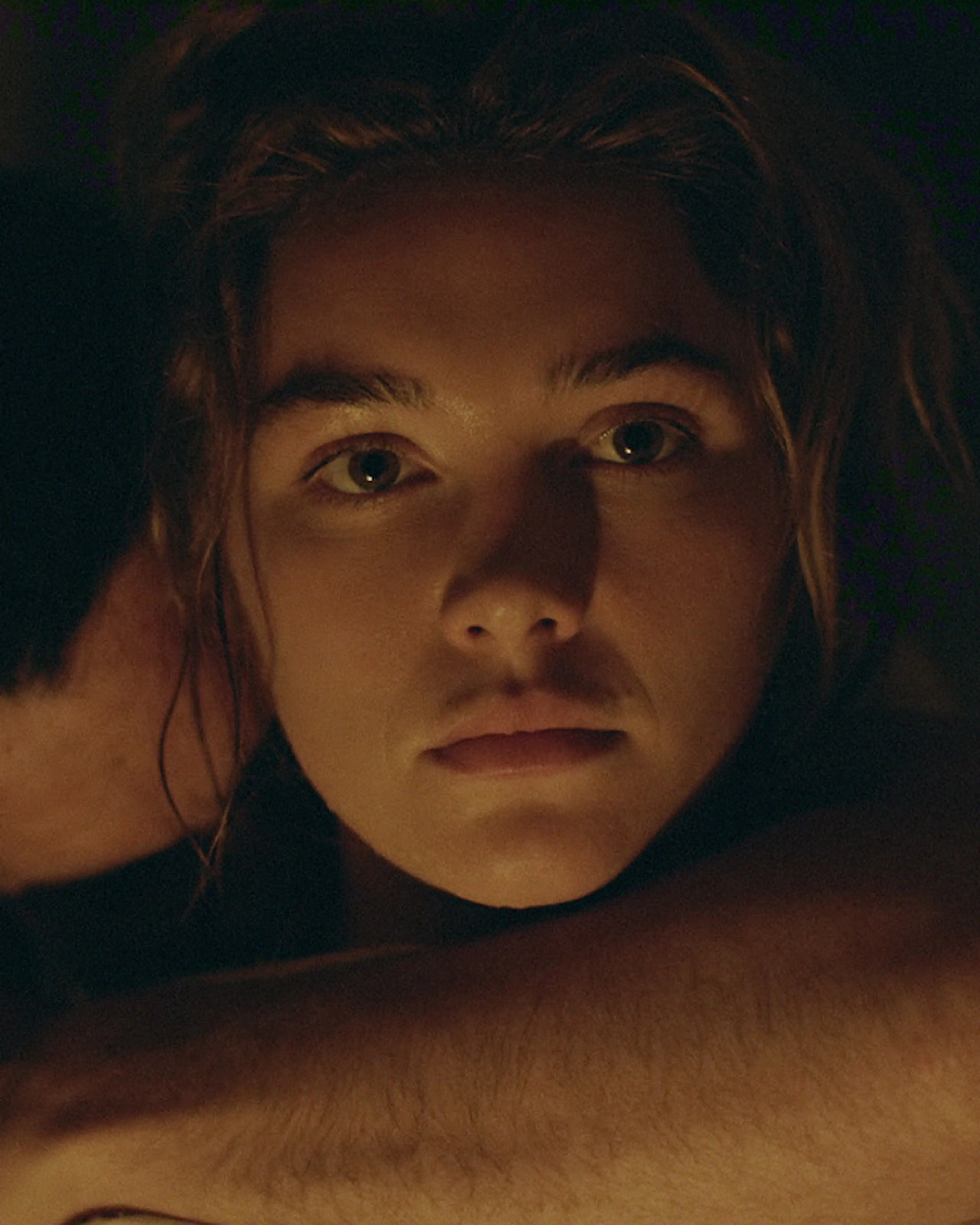 Florence Pugh as Cathy Ames in an embrace in East of Eden.
