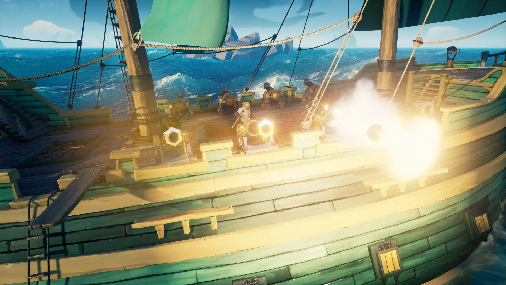 A cannon fires from a pirate ship deck in daylight with the sea beyond.