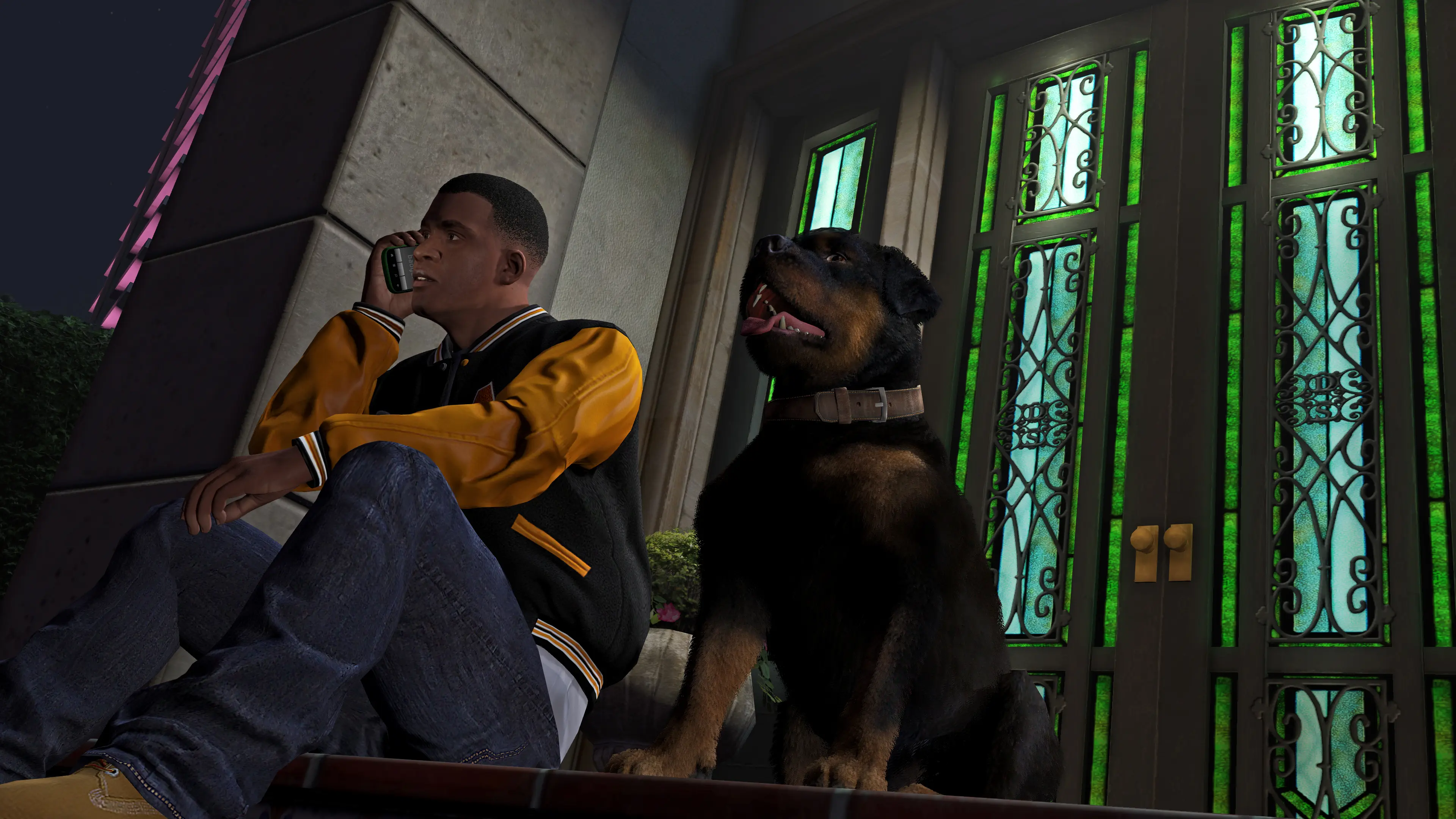 Franklin Clinton standing with Chop in GTA 5 Story Mode.