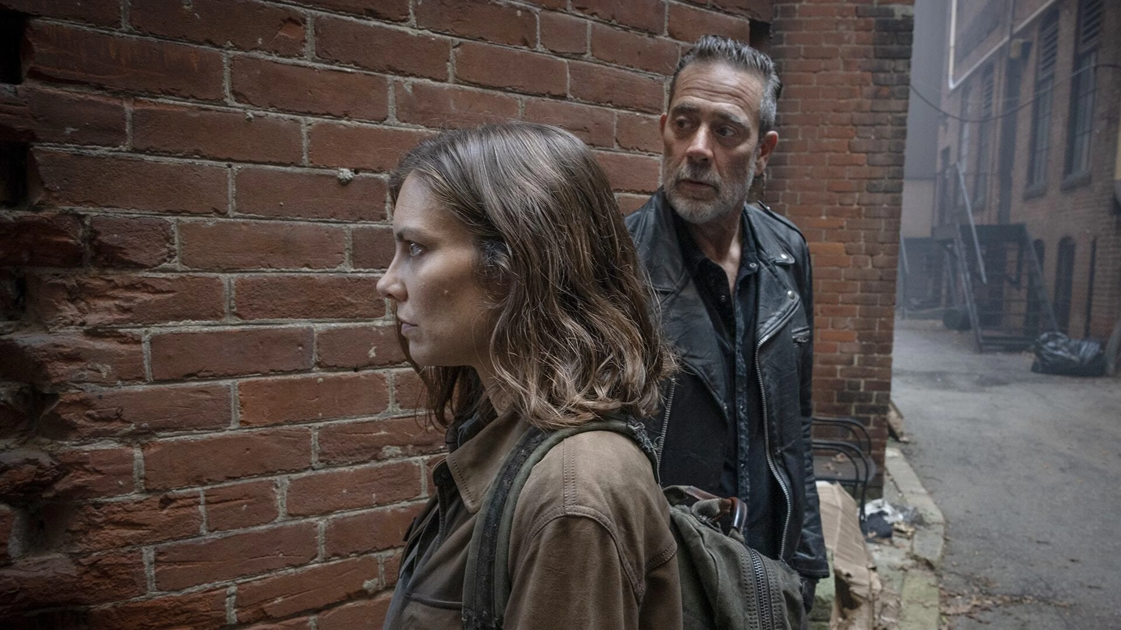 Lauren Cohan and Jeffrey Dean Morgan appear together in an official Dead City Season 3 still.