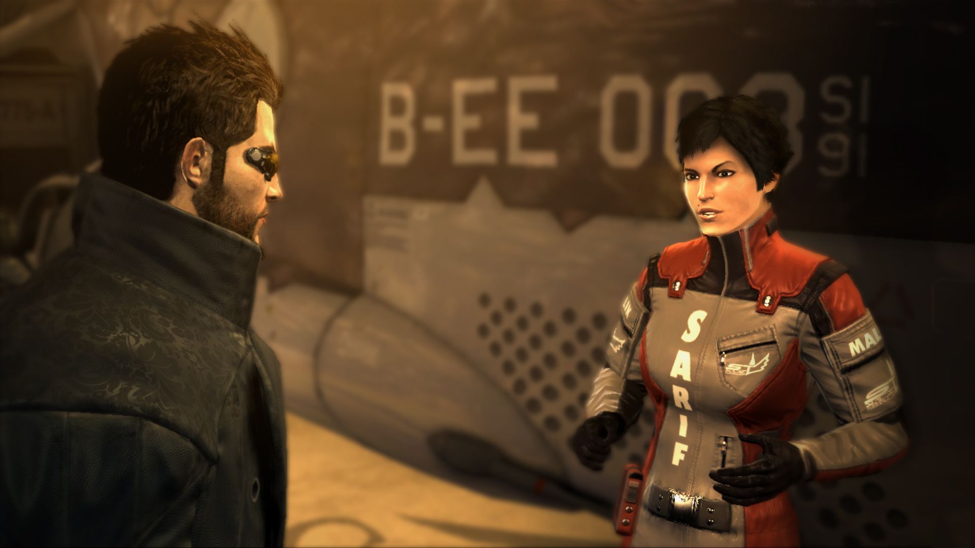 Adam Jensen speaks with pilot Faridah Malik, who wears a red-and-gray Sarif jacket.