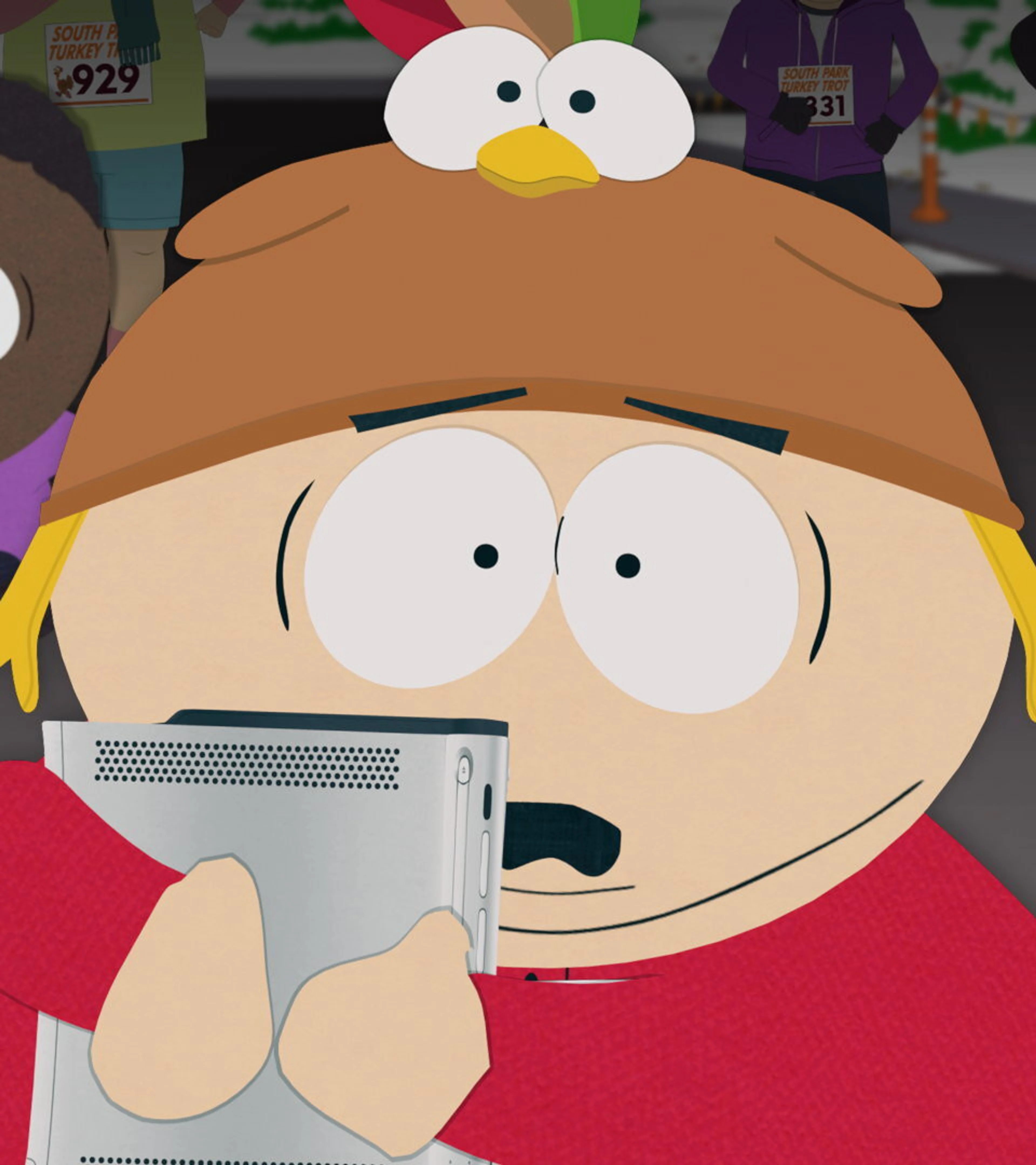 Cartman wears a turkey hat while Tolkien stands behind him in a South Park Season 28 scene.