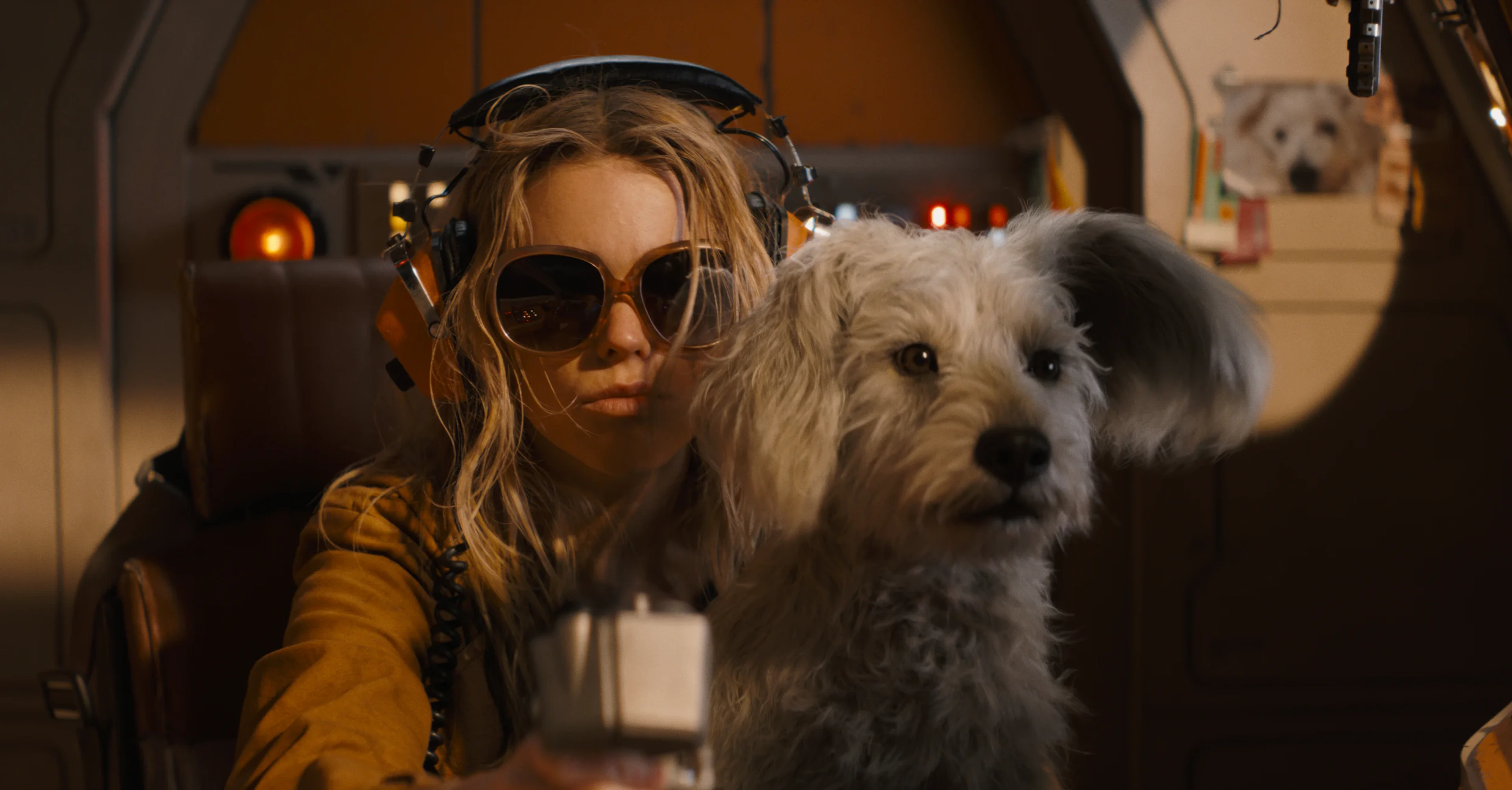 Milly Alcock as Kara with Krypto in an official Supergirl still.