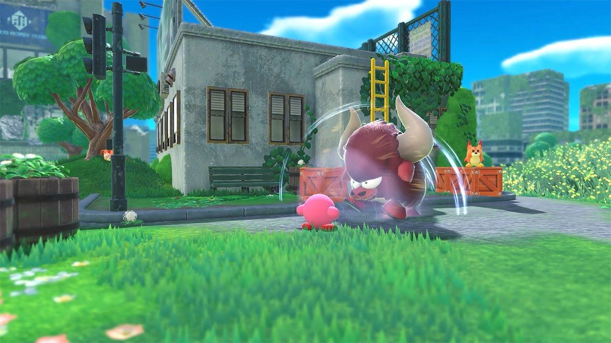 Kirby faces a large enemy in an abandoned city.
