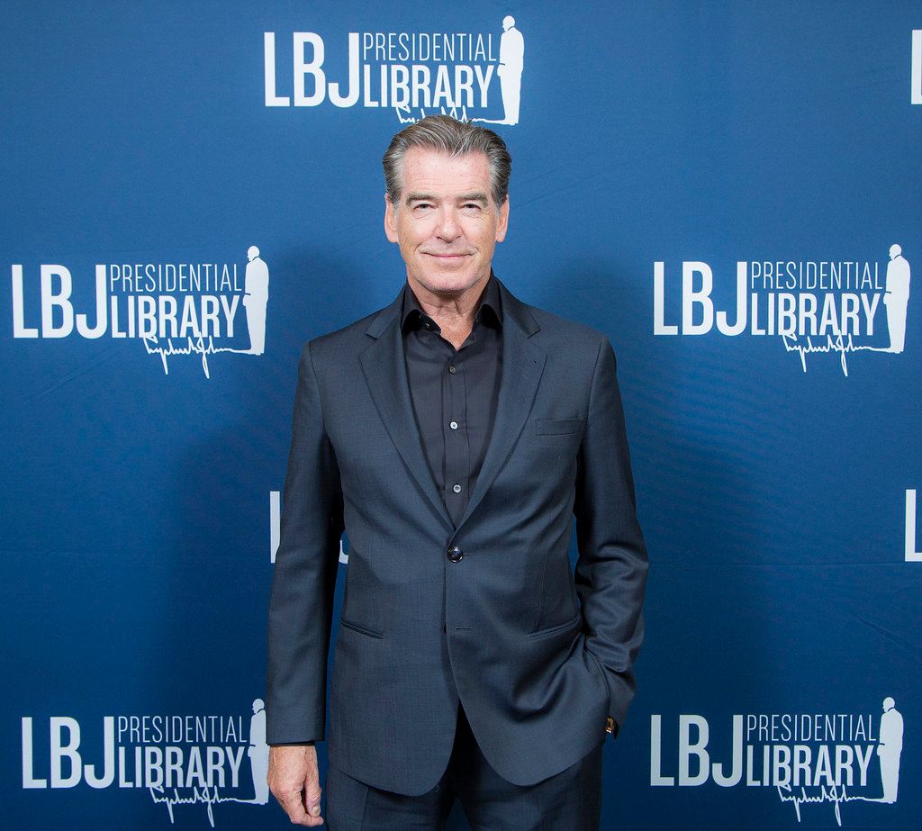 Pierce Brosnan in a dark suit at the LBJ Presidential Library in 2017.