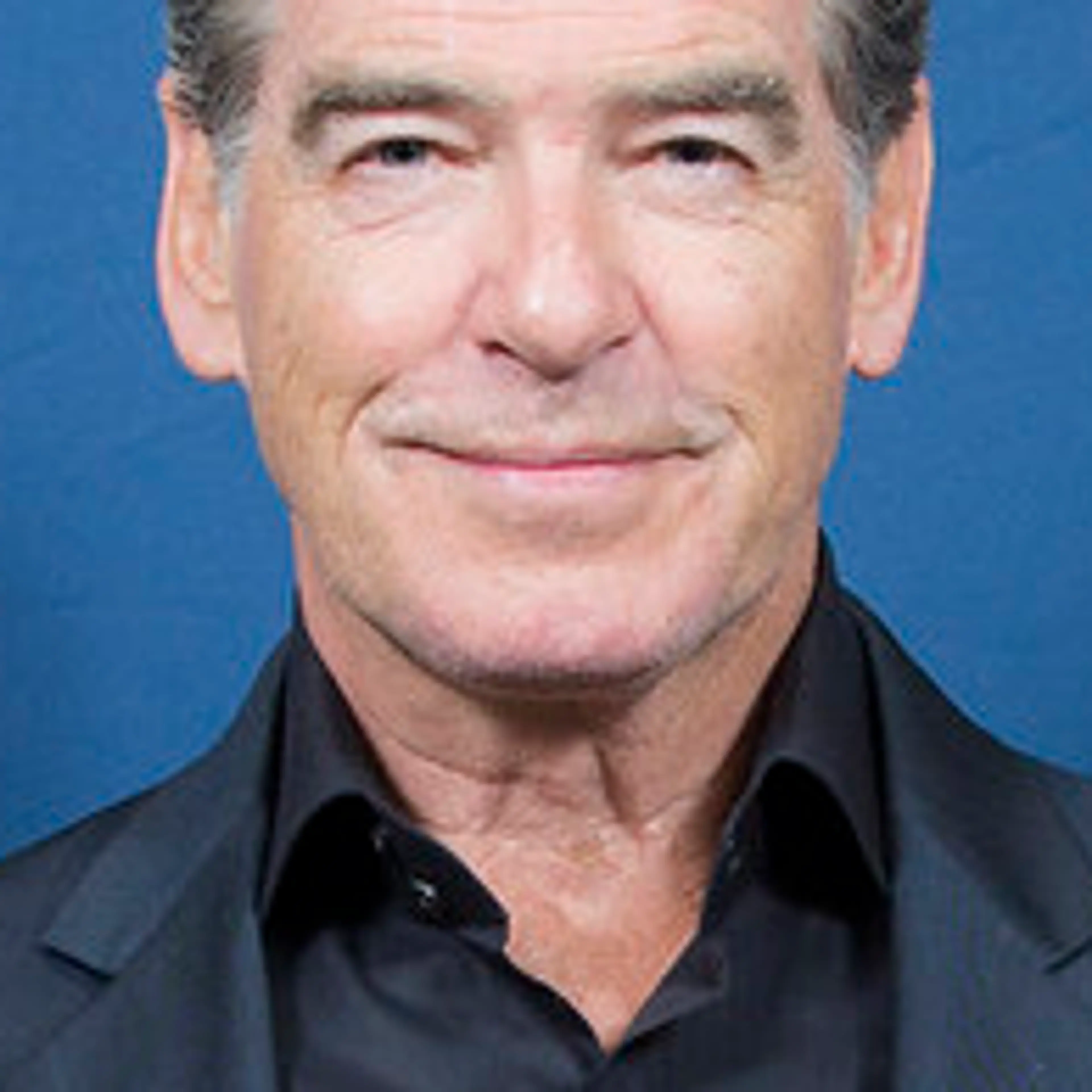 Pierce Brosnan in a dark suit at the LBJ Presidential Library in 2017.