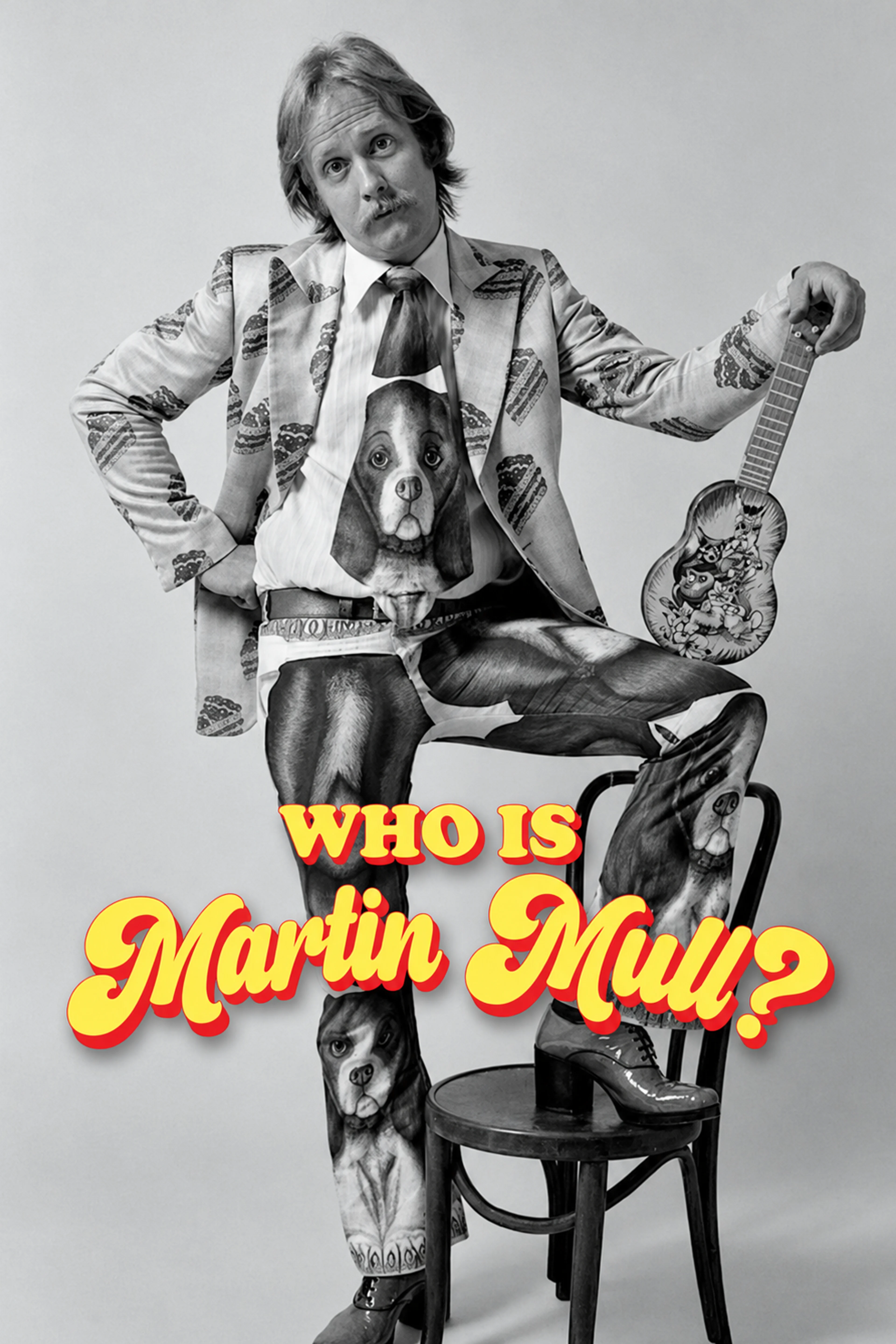 Martin Mull sits with a small guitar in the yellow-and-red-titled Who Is Martin Mull? poster