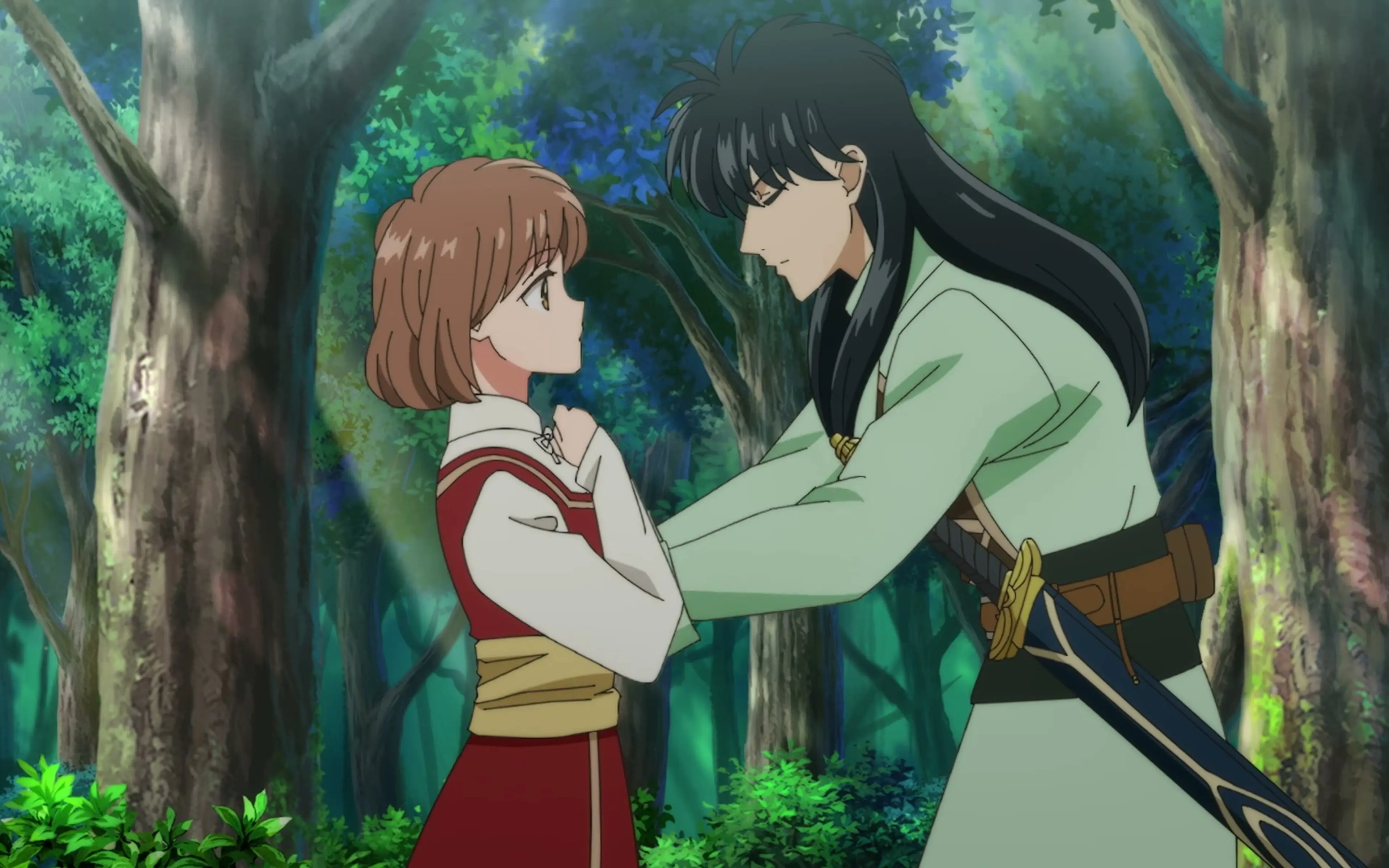 Noriko and Izark face each other in a green forest in the From Far Away anime trailer.