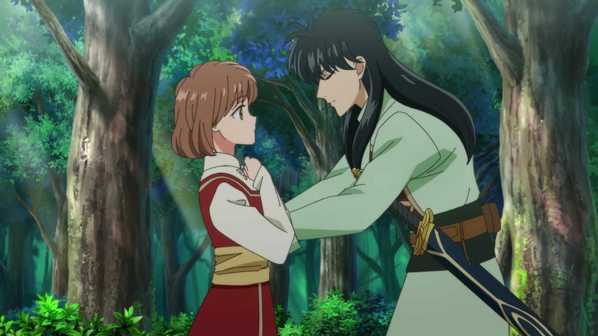Noriko and Izark face each other in a green forest in the From Far Away anime trailer.