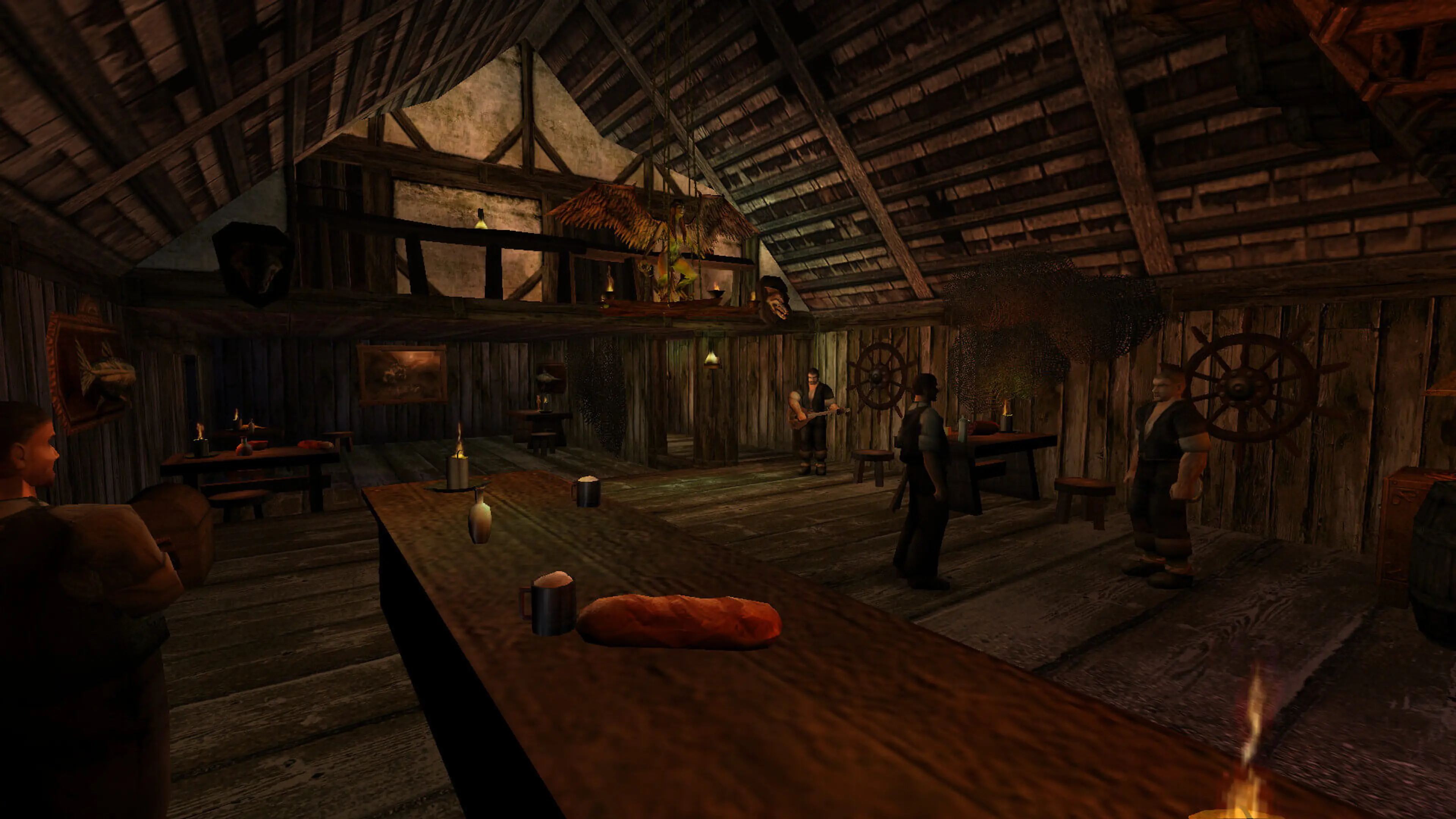 The Nameless Hero talks with people inside a tavern.