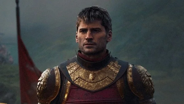 An armored commander stands in front of a red banner in clean Game of Thrones: War for Westeros artwork.