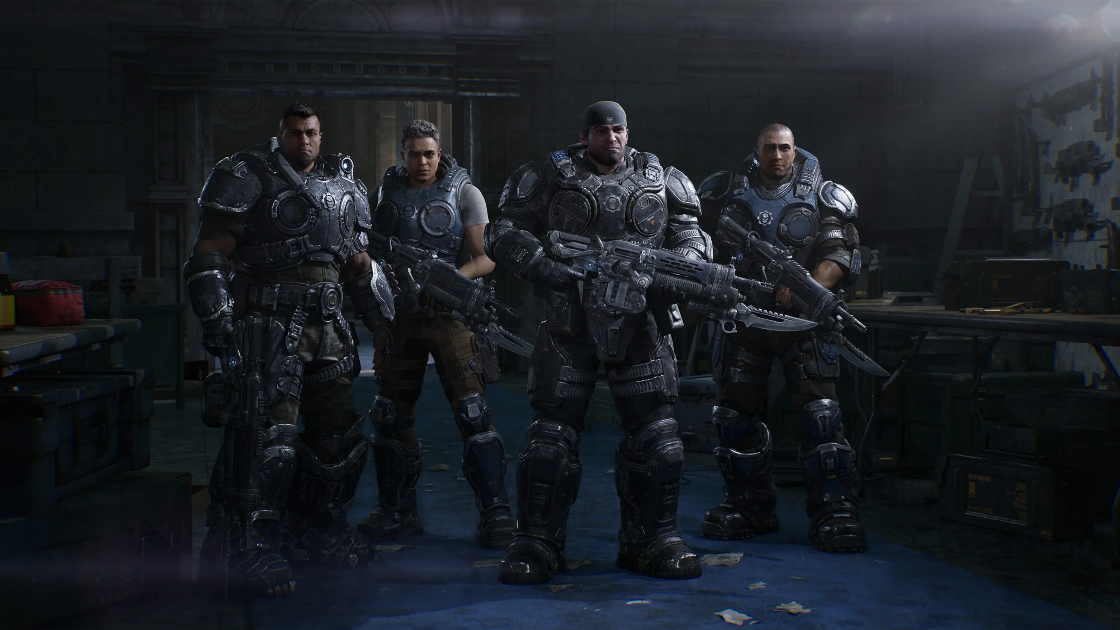Marcus, Dom, Mags and Lucas stand together in armour on a damaged Kalona street.