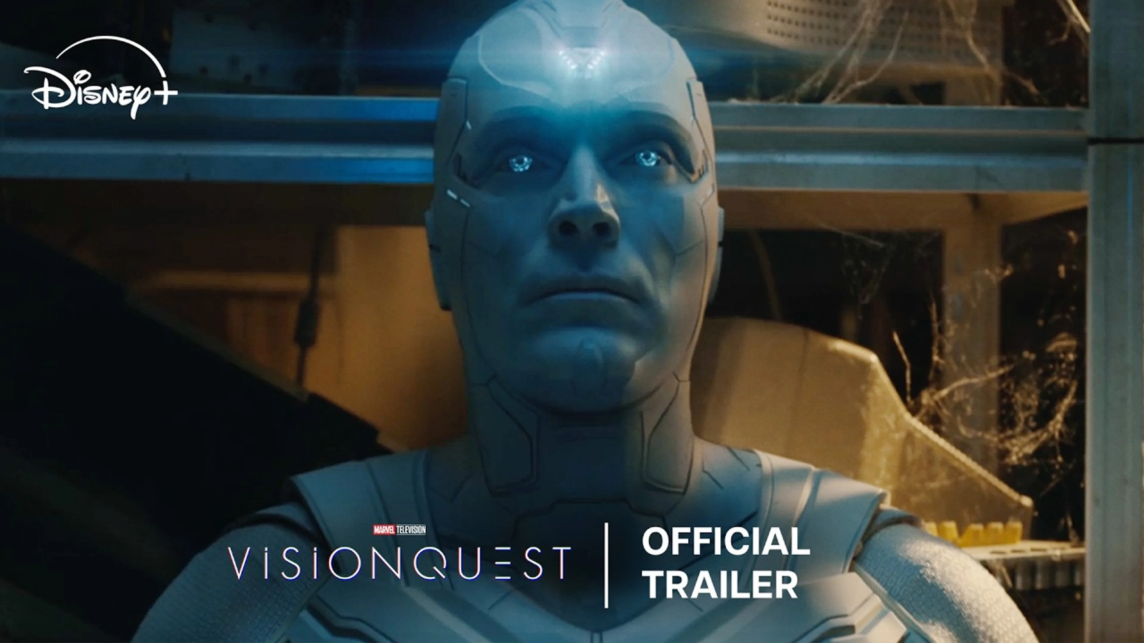 The official VisionQuest trailer thumbnail shows White Vision in a damaged workshop beneath the Disney+ logo.